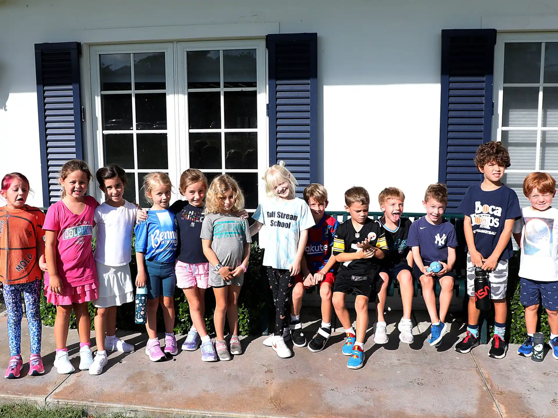 a group of children posing for a photo