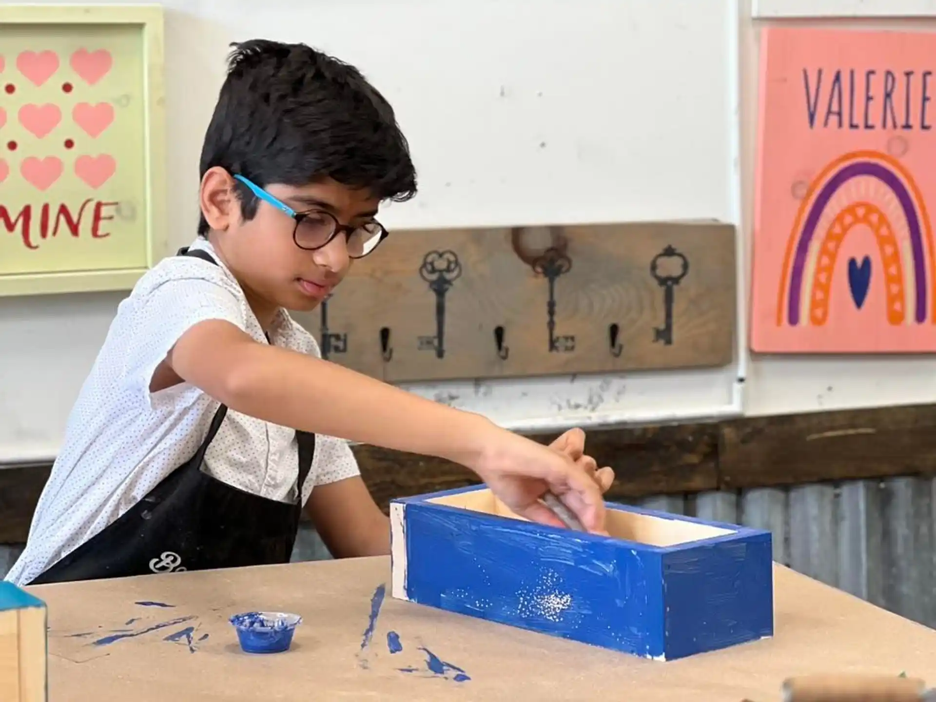 a young boy painting