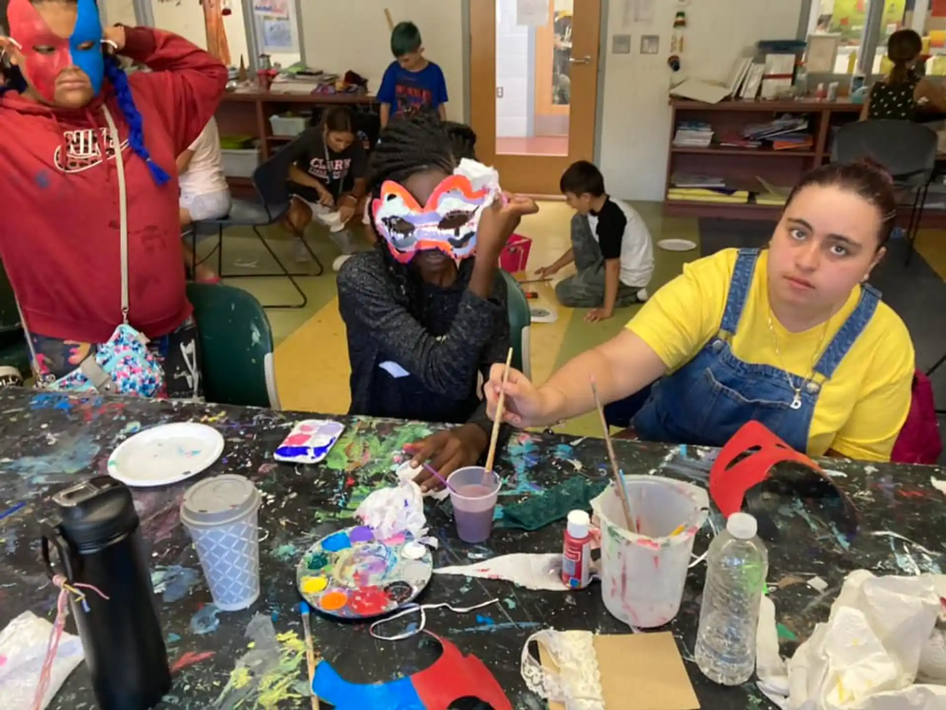 a group of people painting