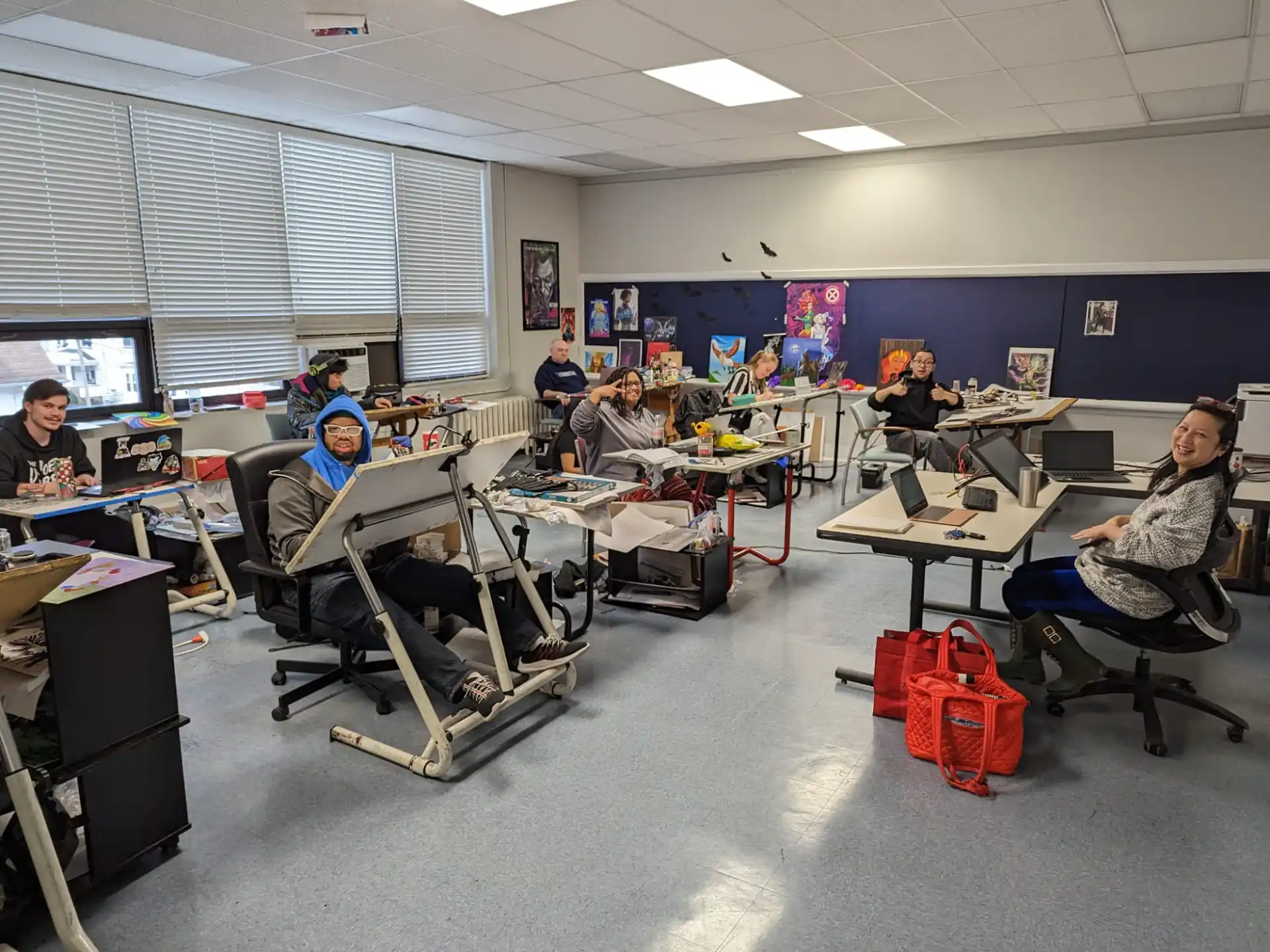 a group of people in an office