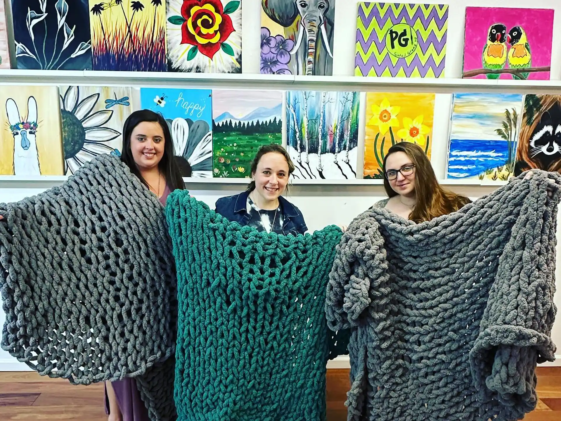 a group of women in dresses