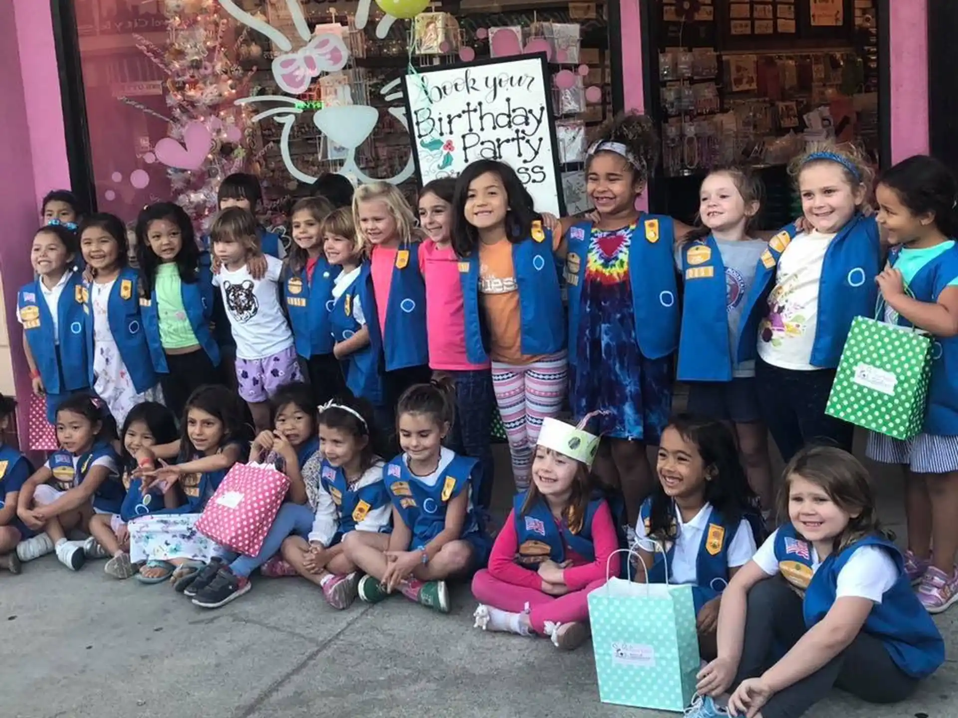 a group of children posing for a photo