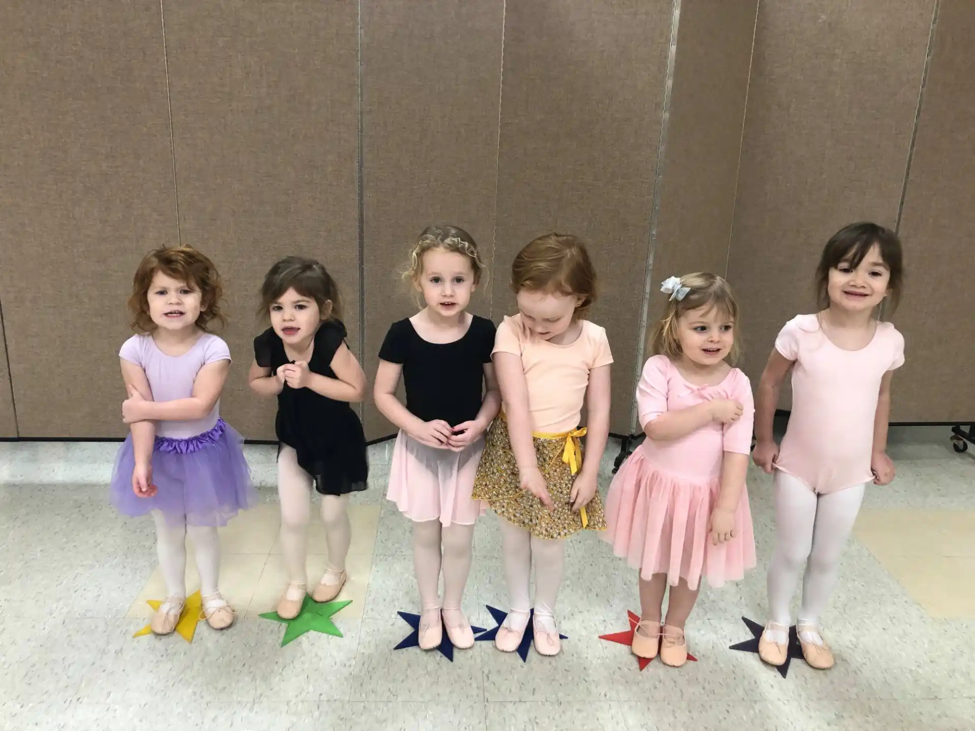 a group of girls posing for a photo