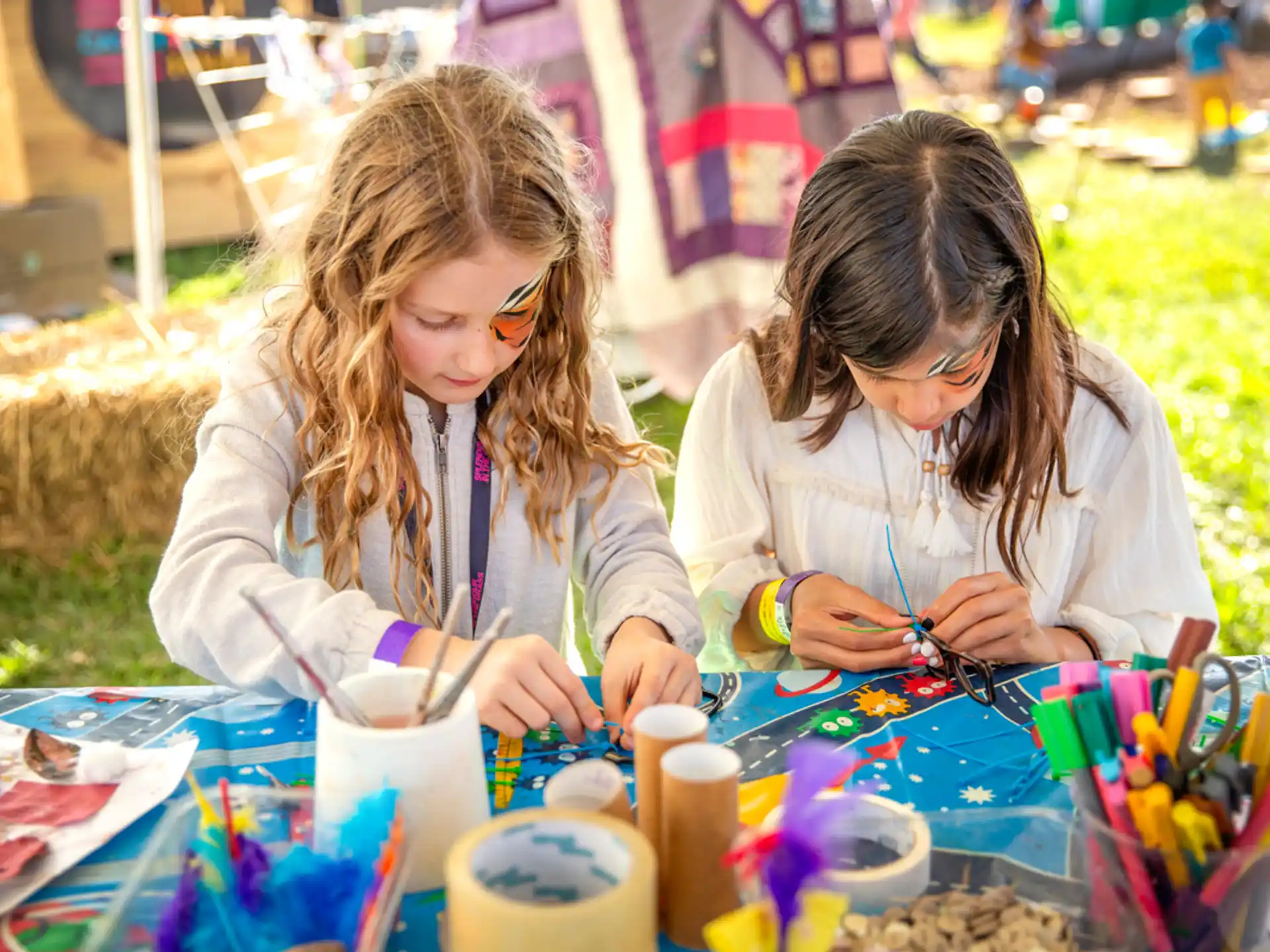 a couple of girls painting