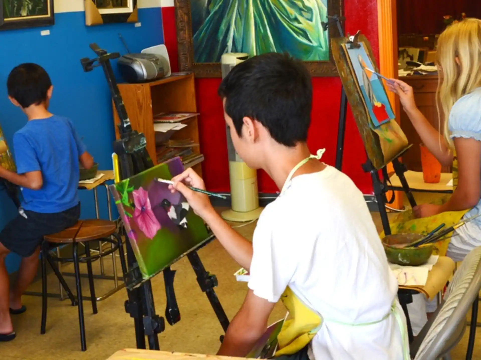 a group of people painting