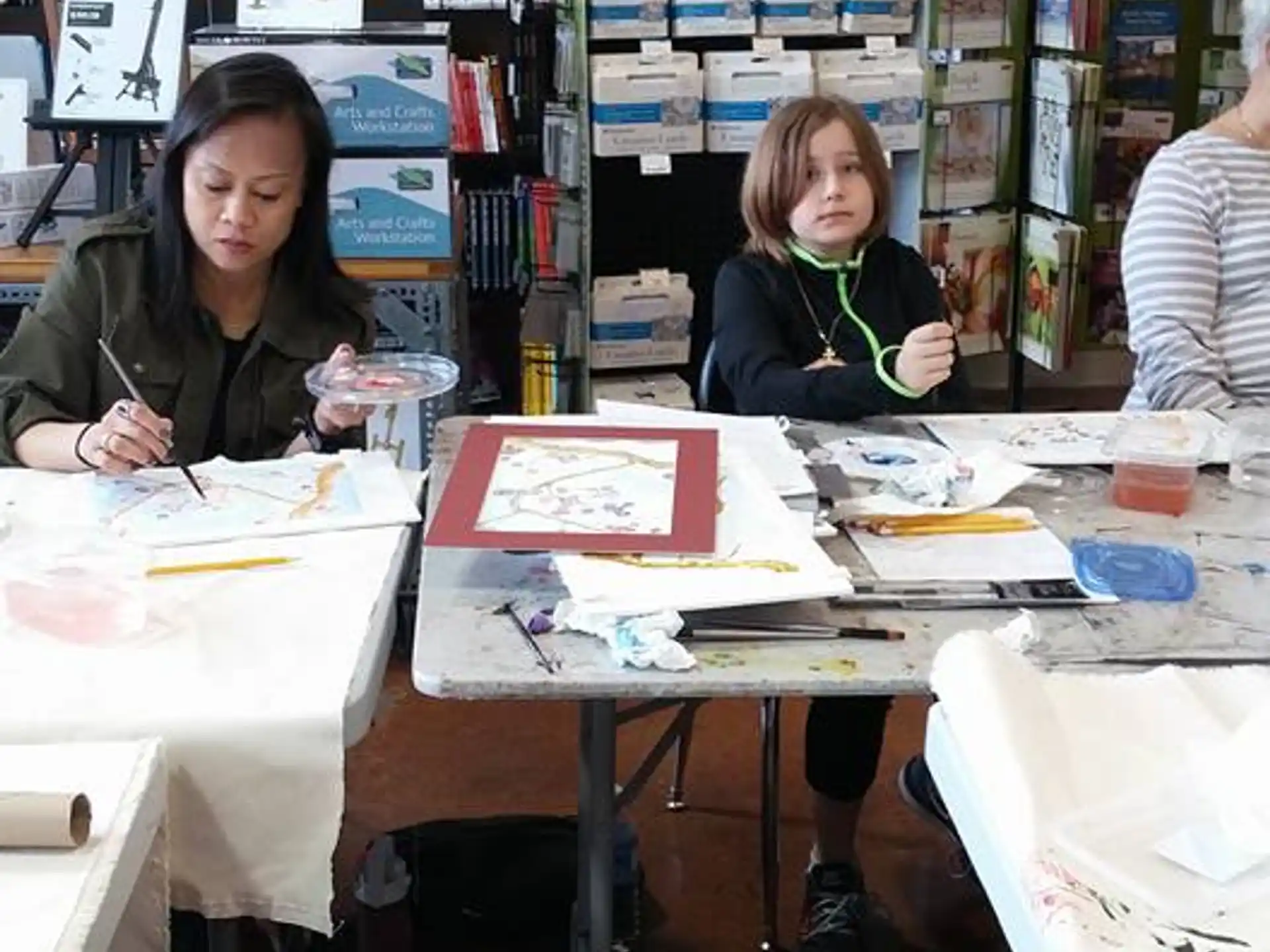 a few young girls in a classroom