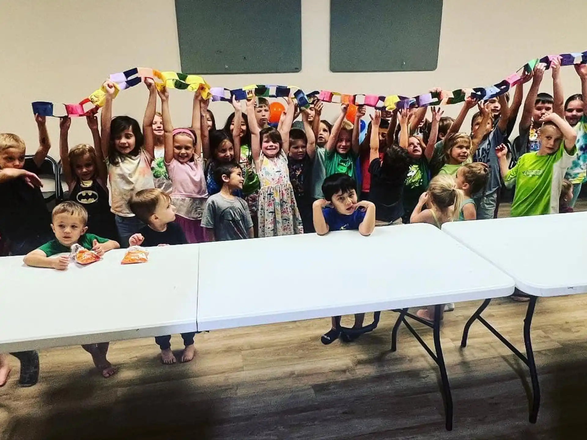 a group of children posing for a photo