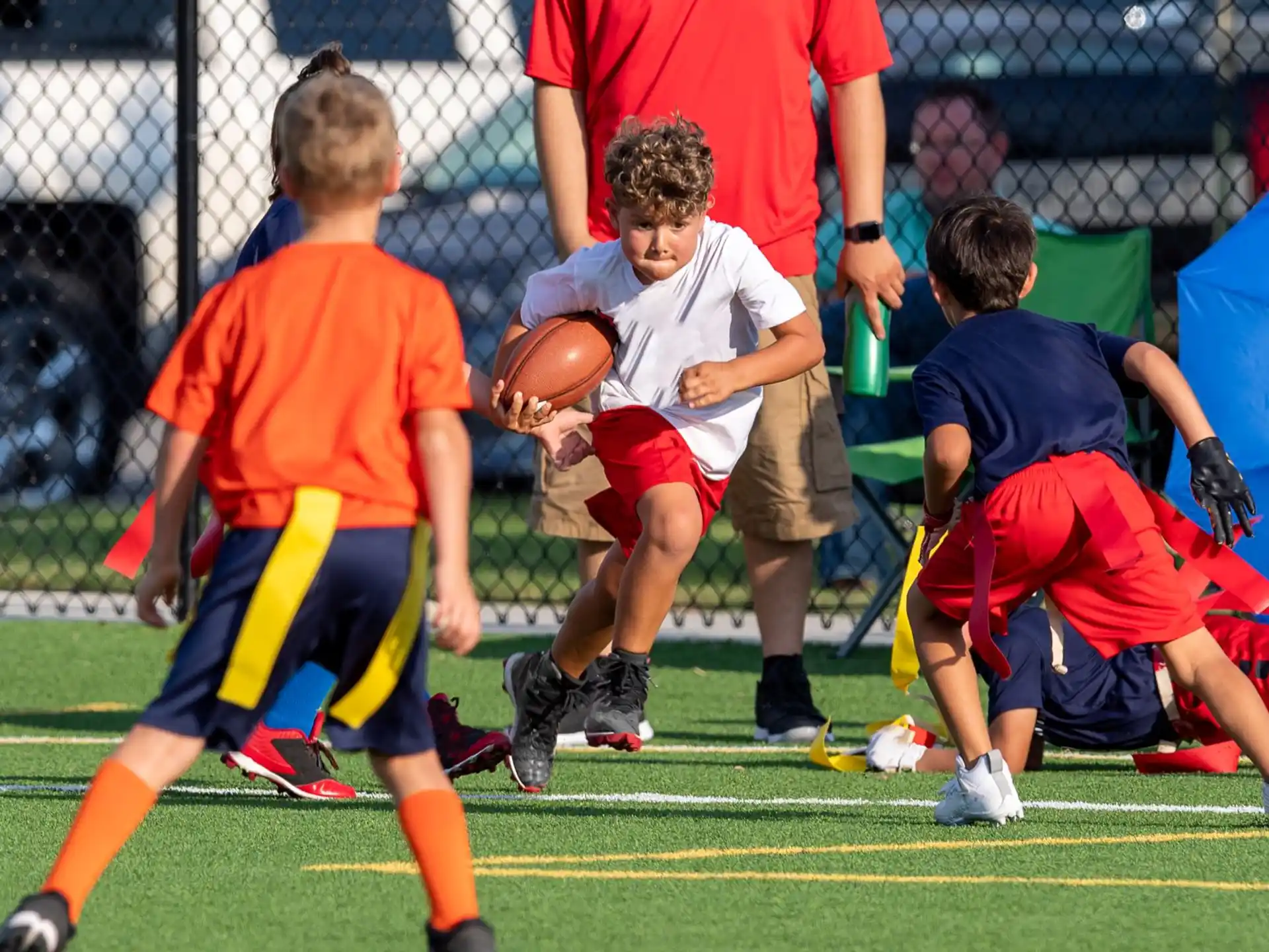 a group of boys playing football