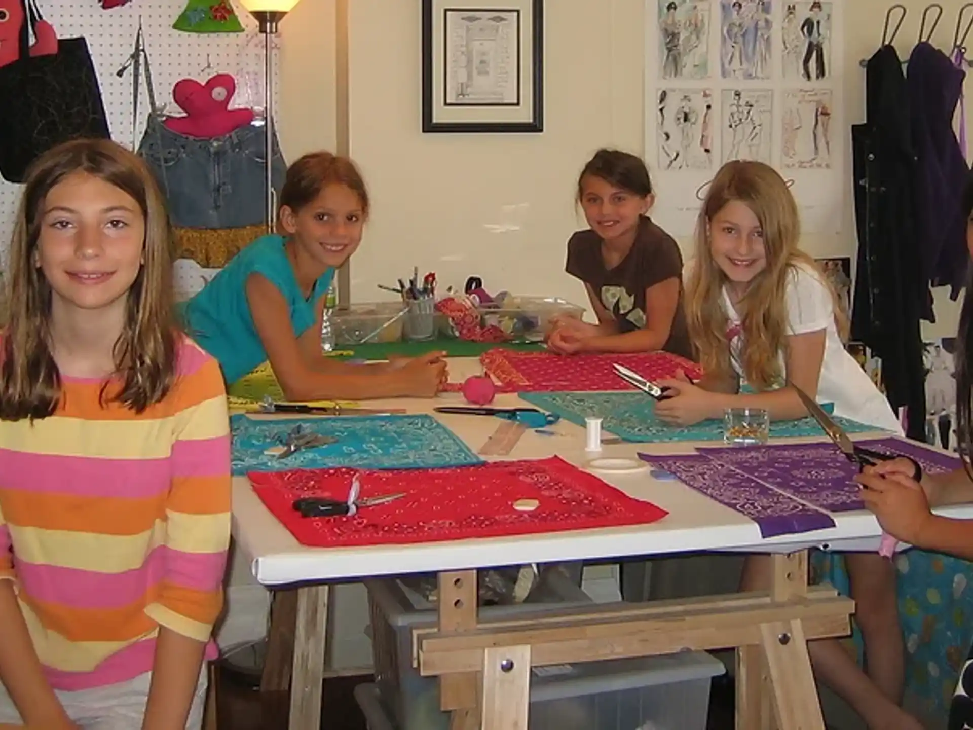 a group of children sitting at a table
