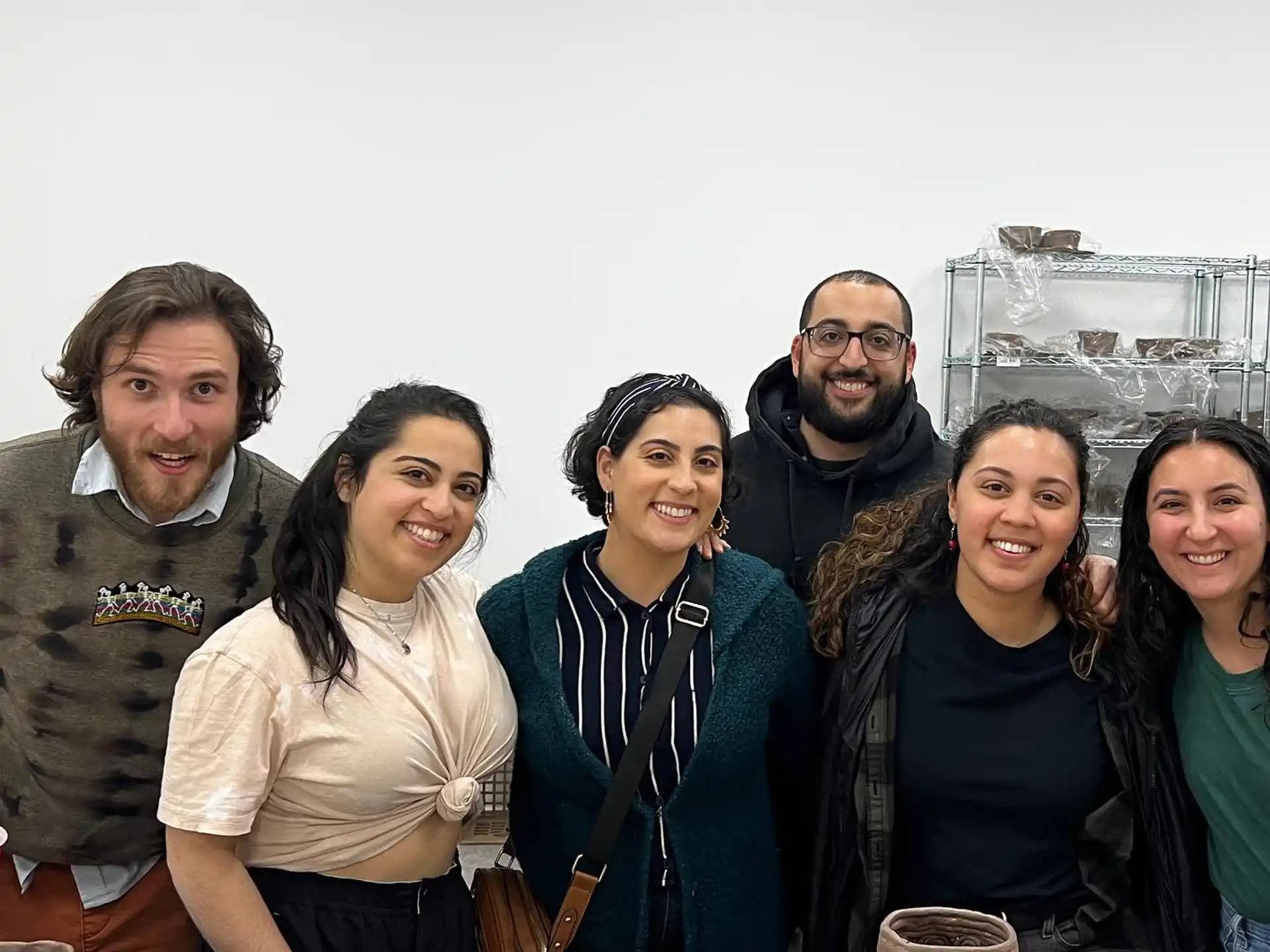 a group of people posing for a photo