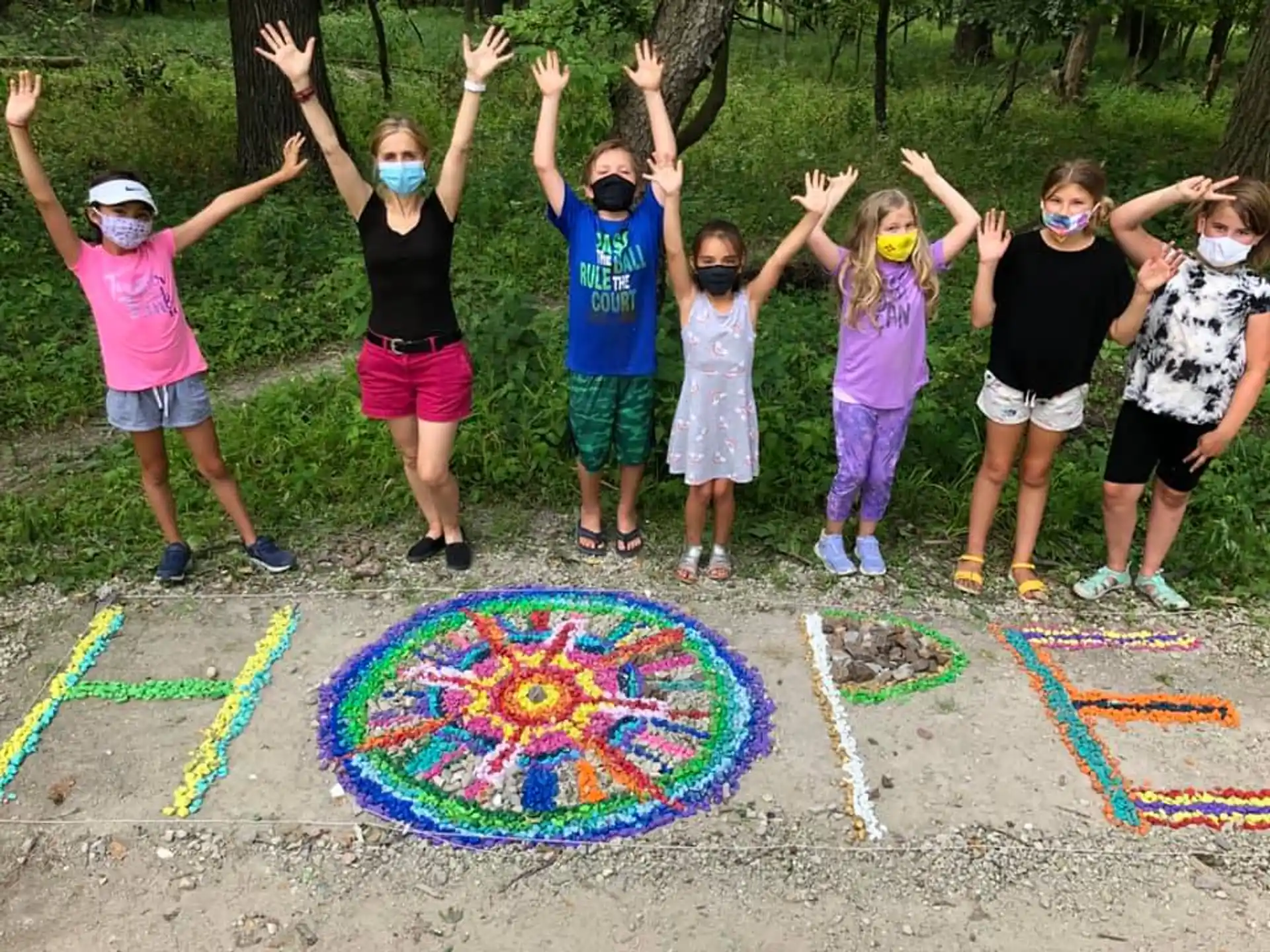 a group of kids posing for a picture