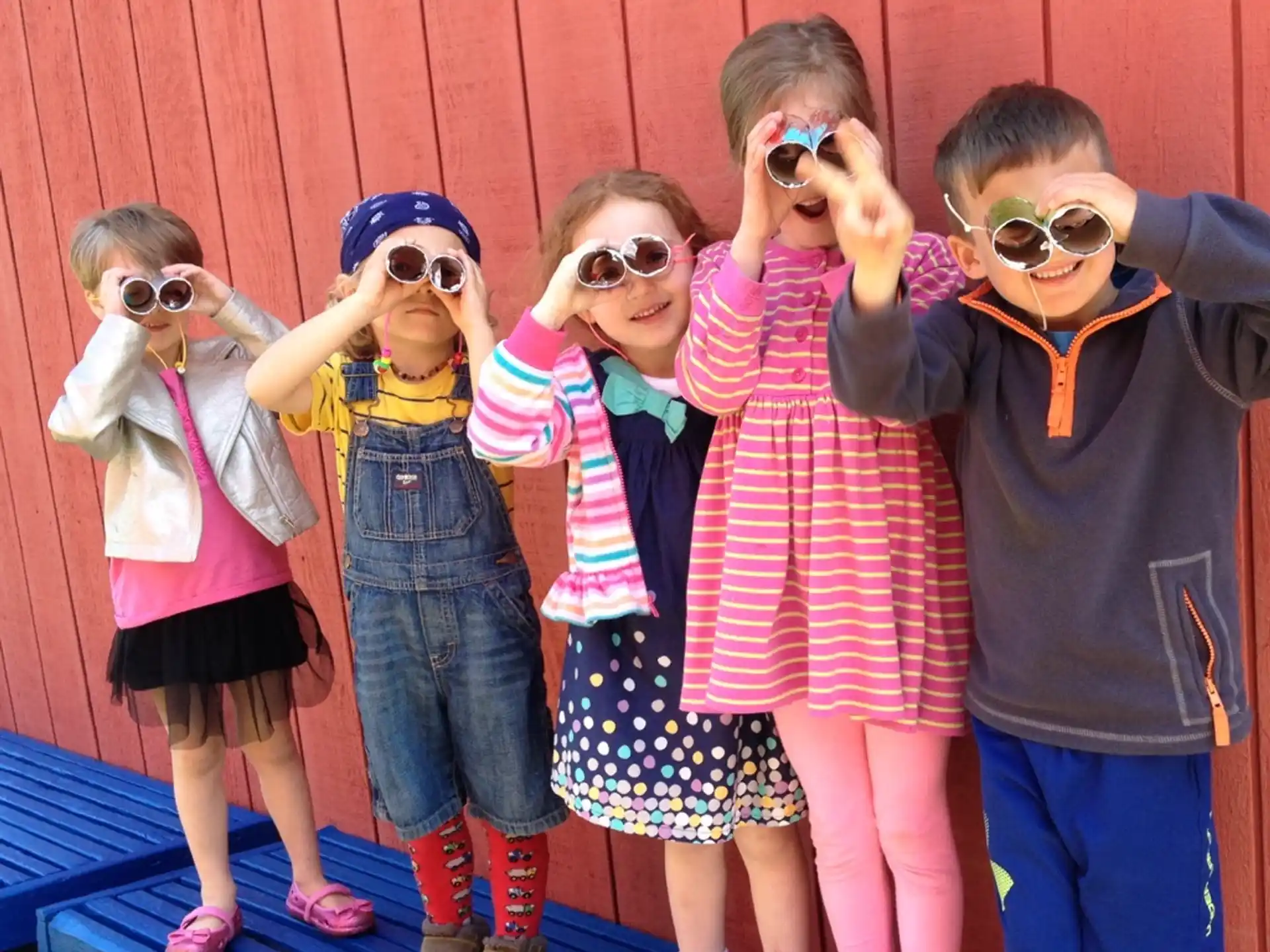 a group of children wearing clothing