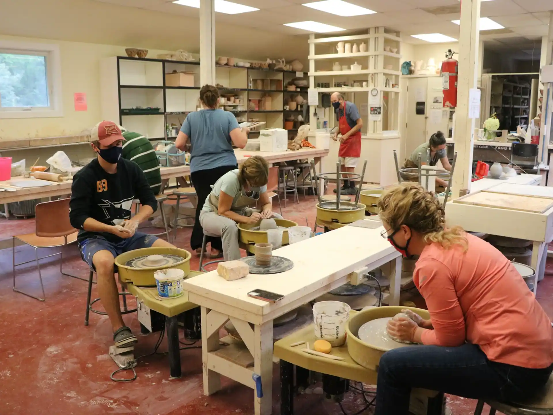 a group of people working in a room