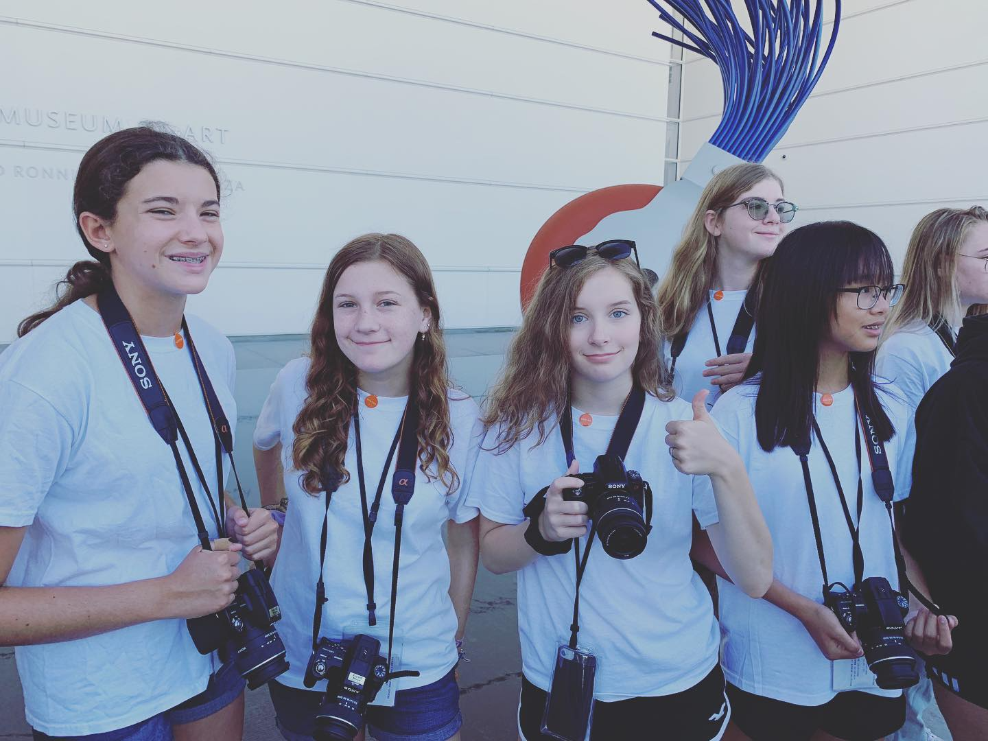 a group of people posing for a photo