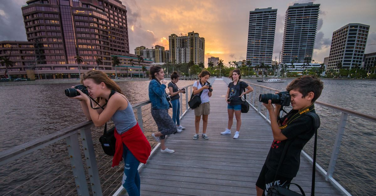 a group of people taking pictures