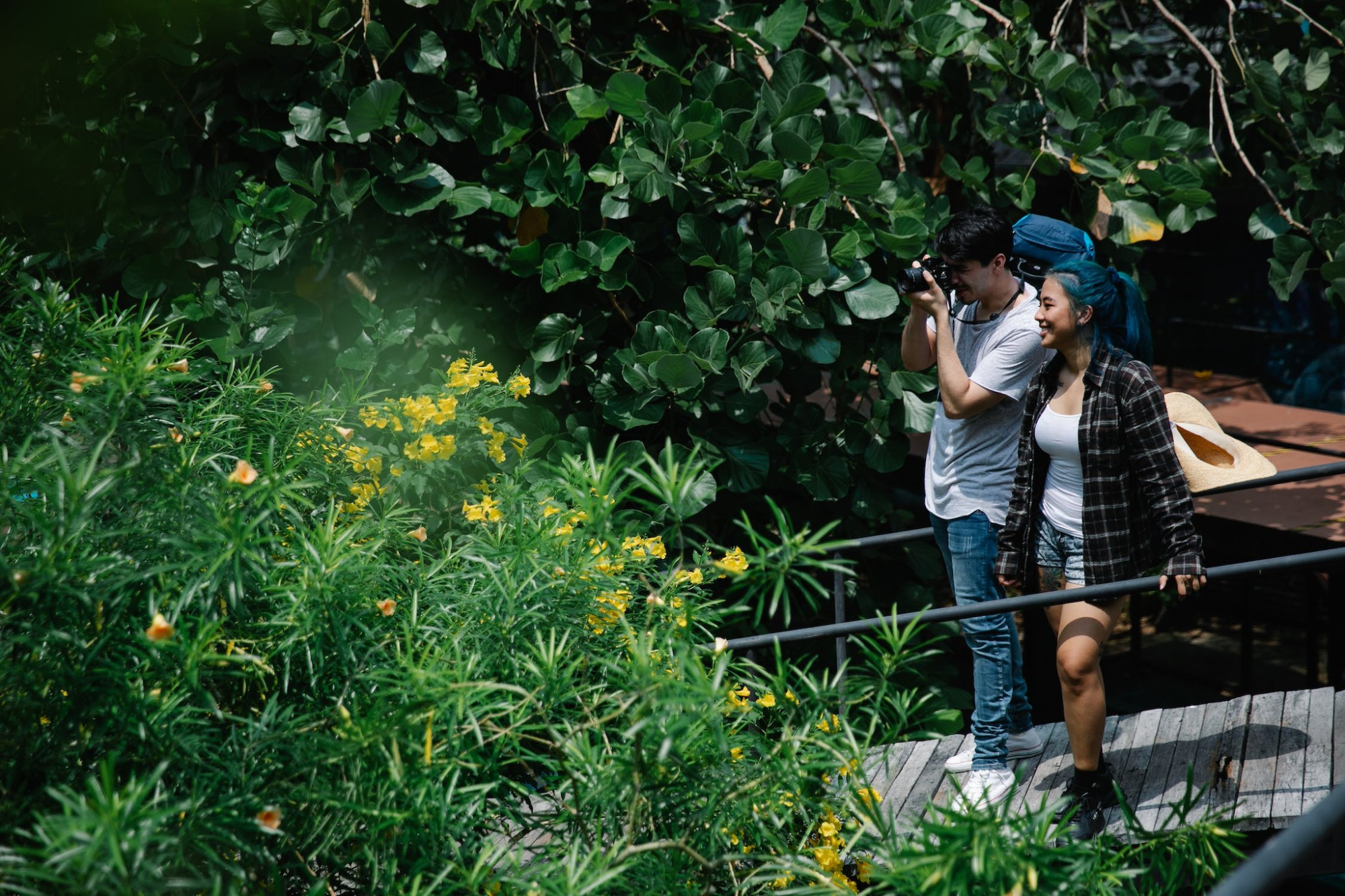 a man and woman taking pictures