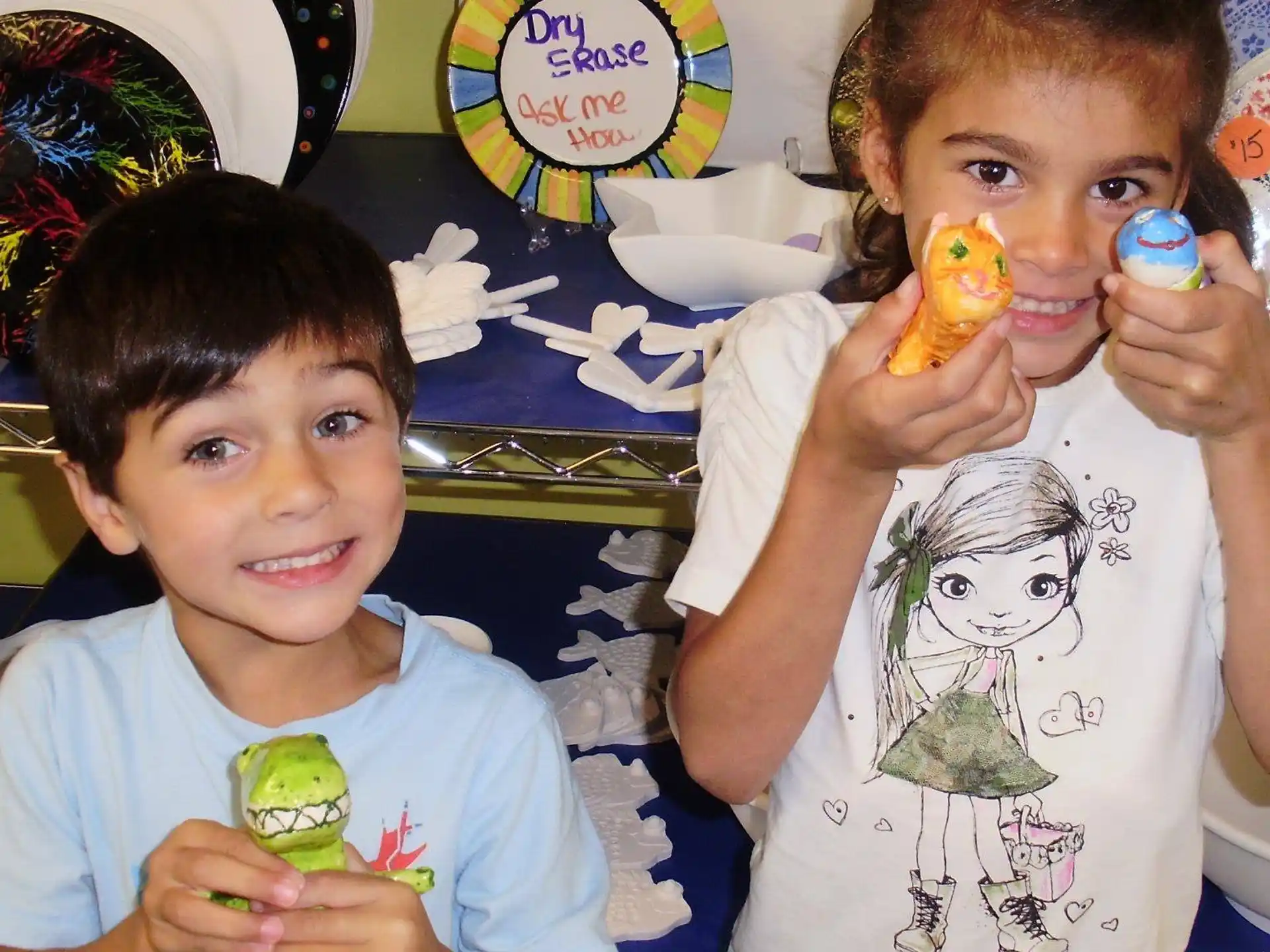 a couple of kids eating food