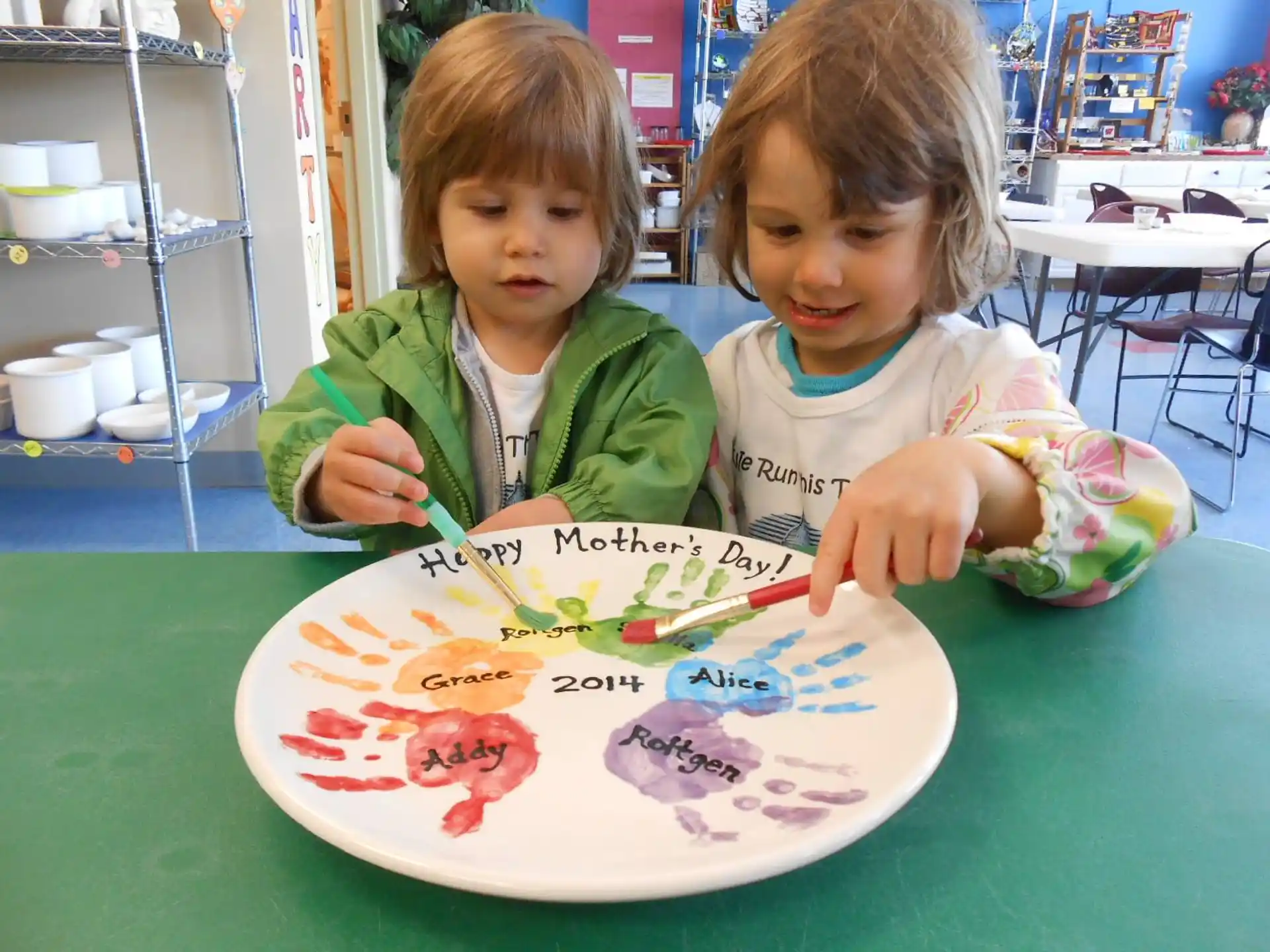 a couple of kids painting