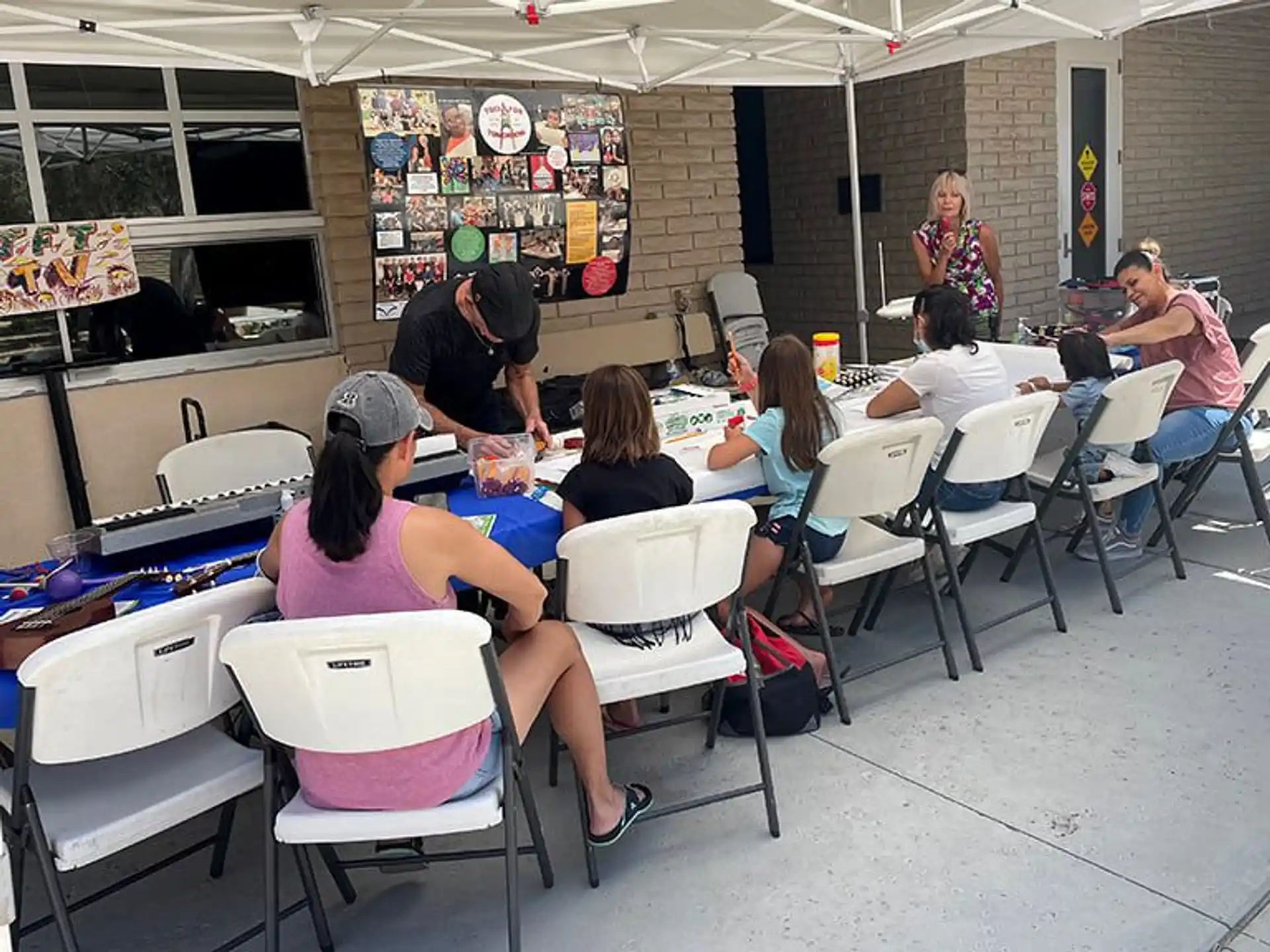 a group of people sitting at tables