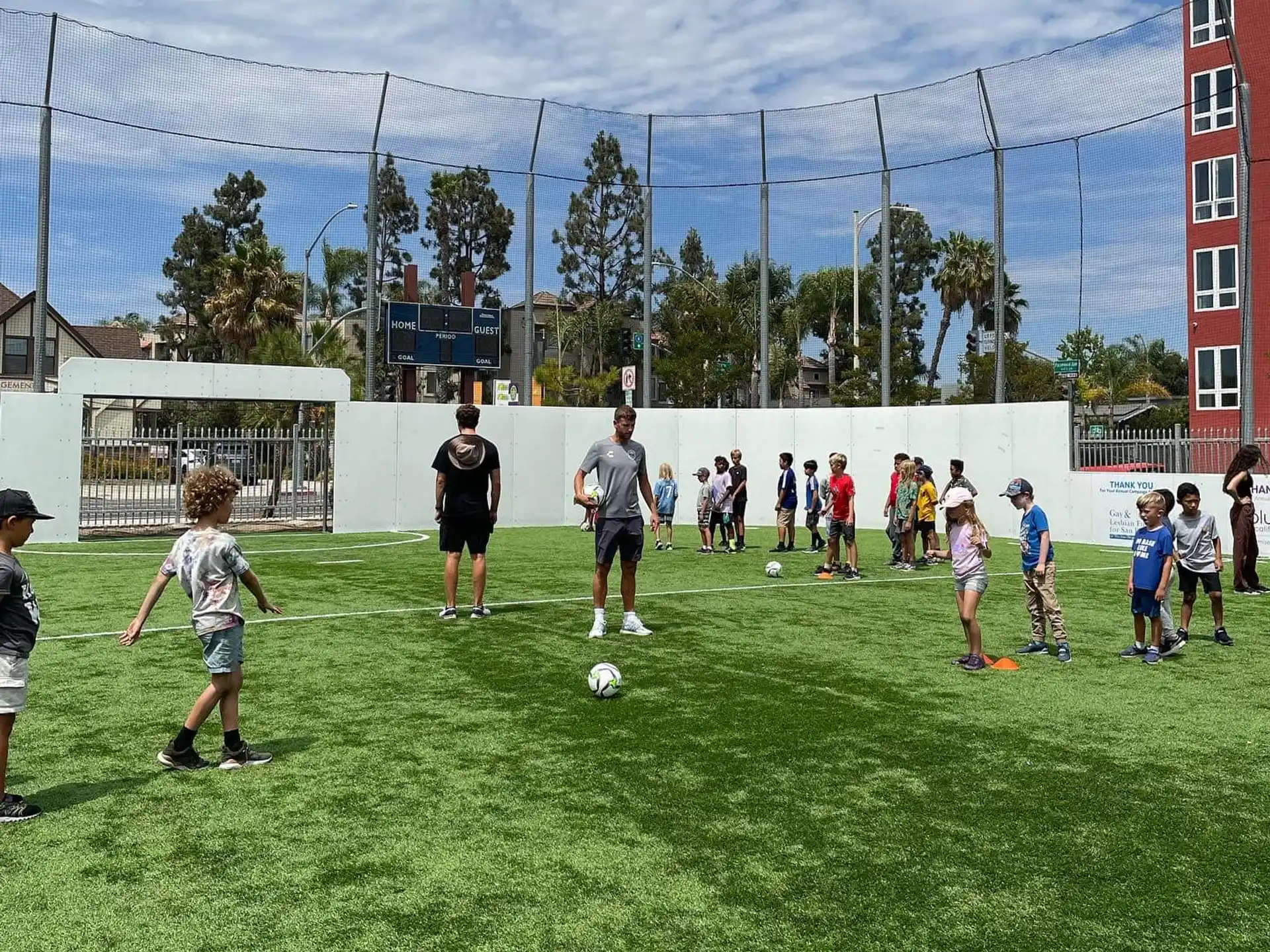a group of people play football
