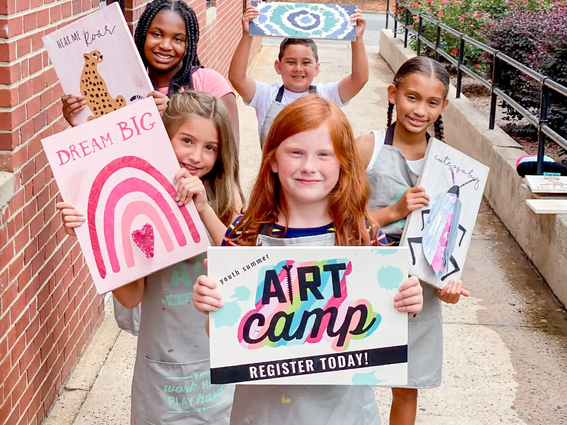 a group of people holding signs
