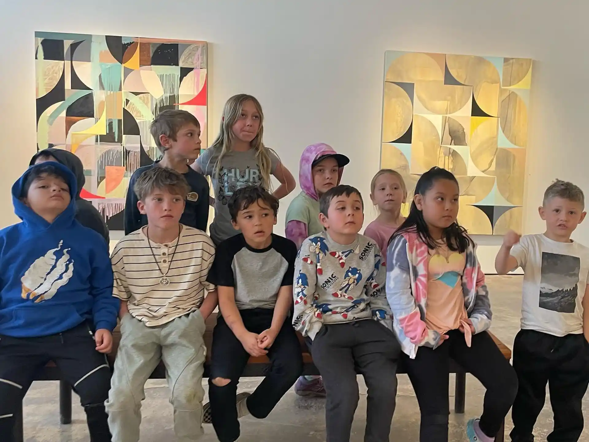 a group of children posing for a photo