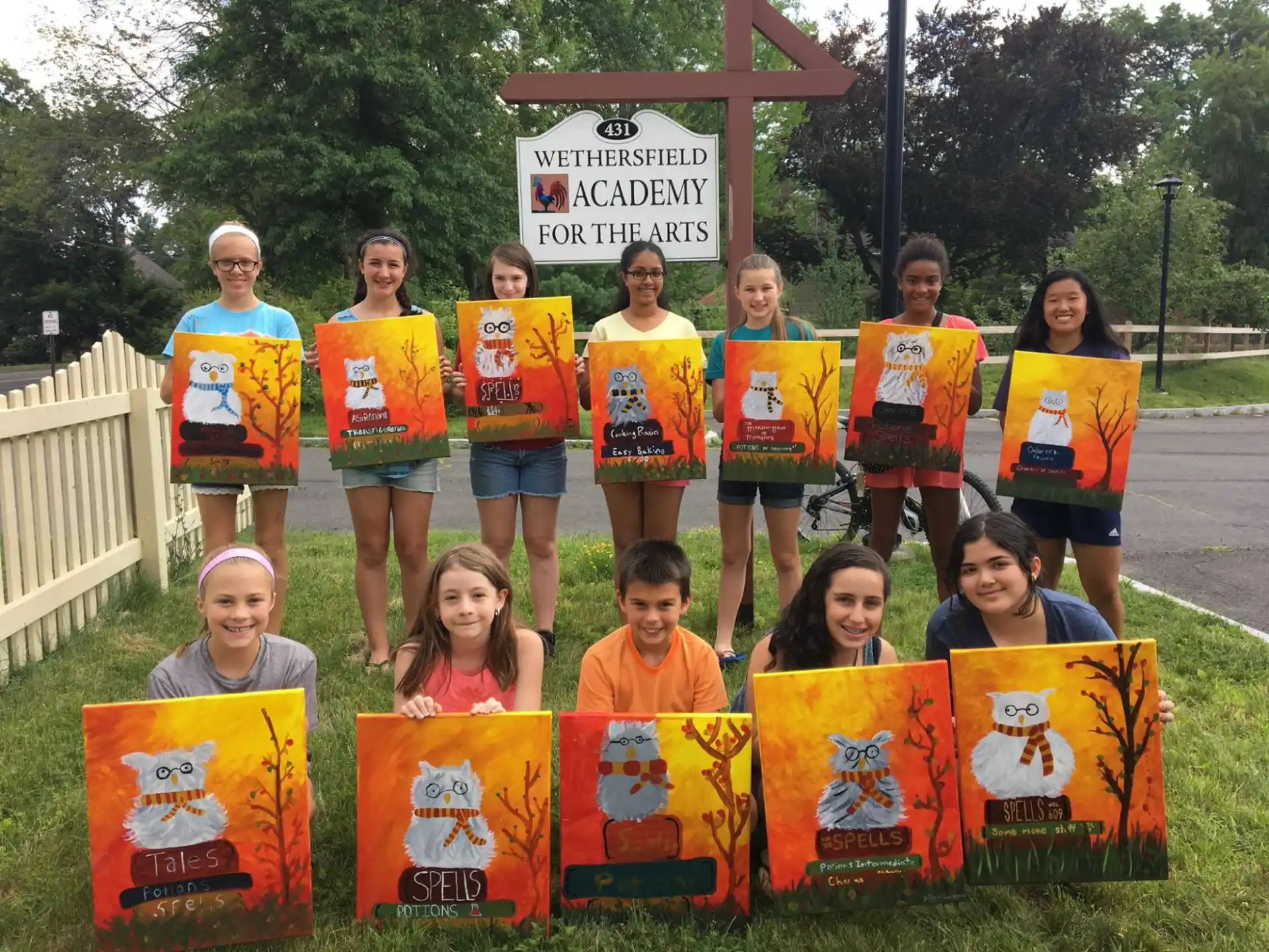 a group of children holding signs