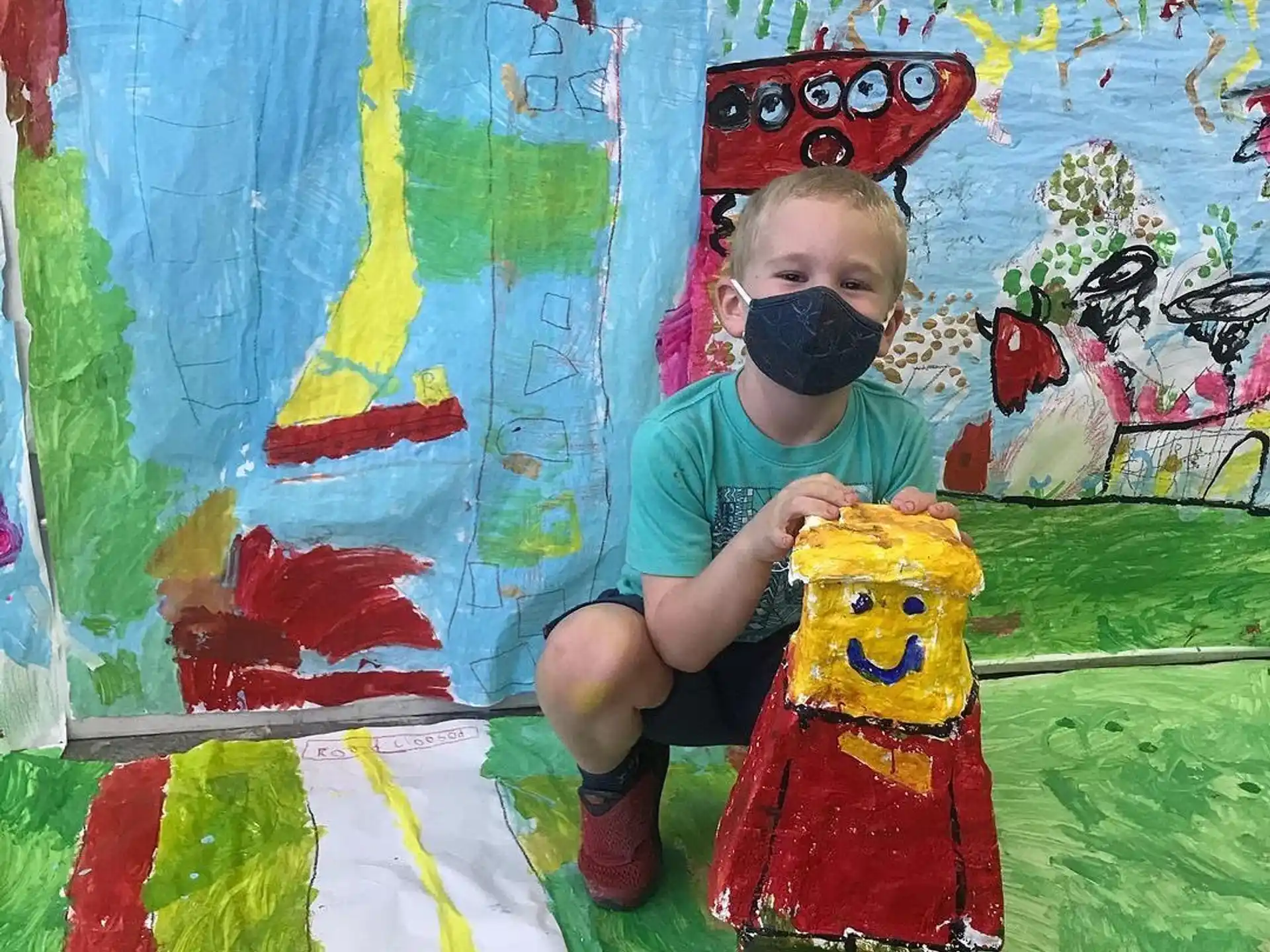 a child sitting on a toy