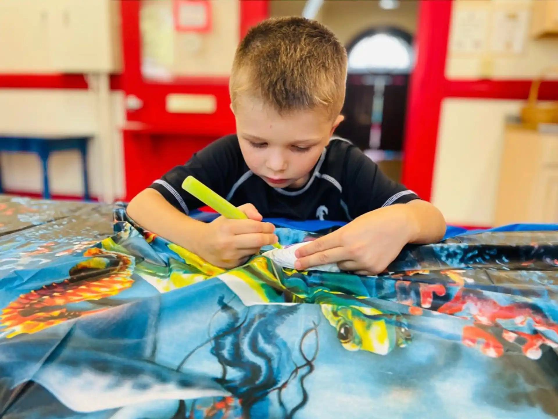 a young boy painting