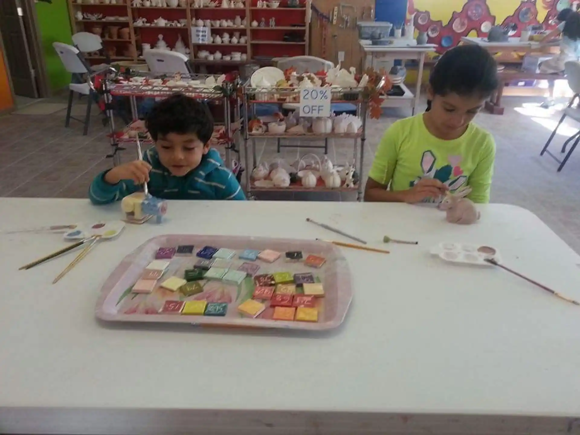 a couple of boys painting