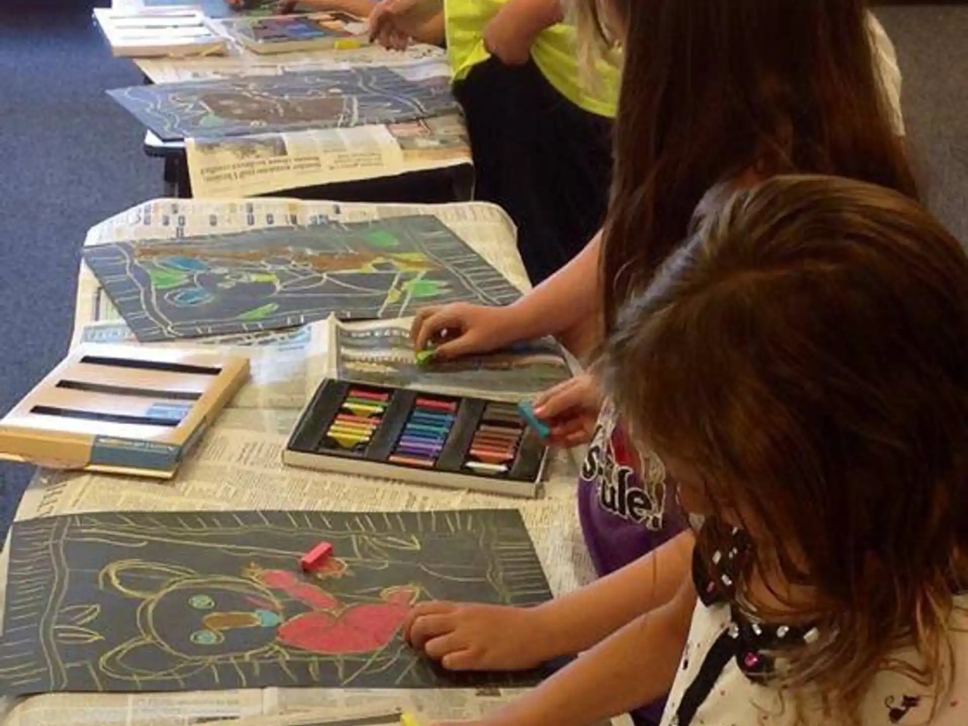 a group of children playing a board game