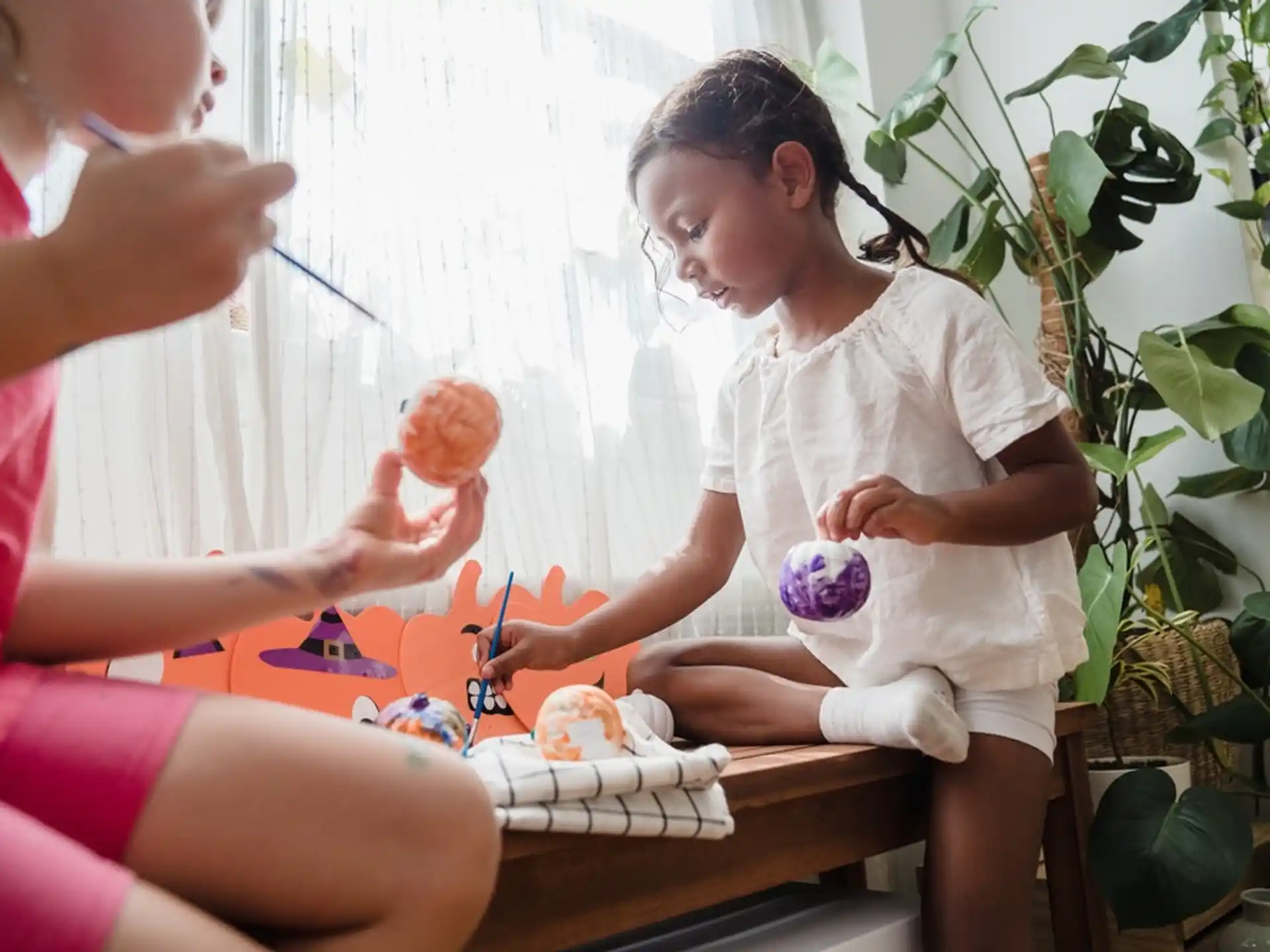 a young girl painting