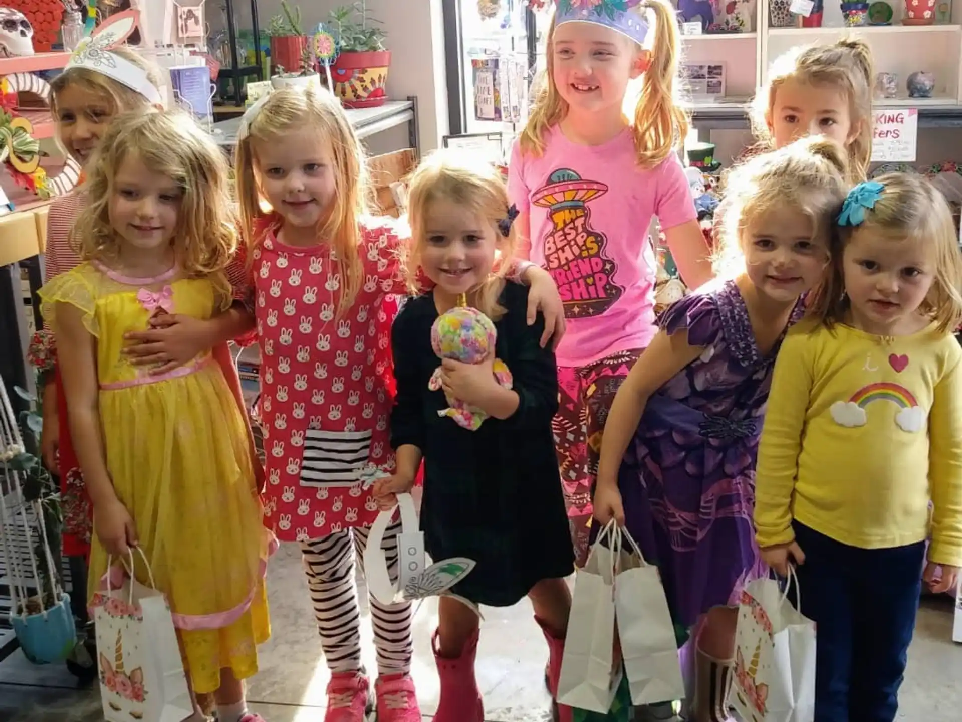 a group of children posing for a photo