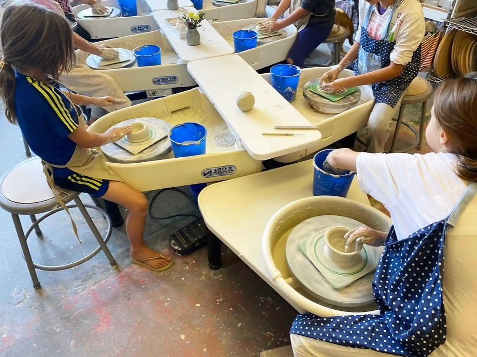 a group of children painting