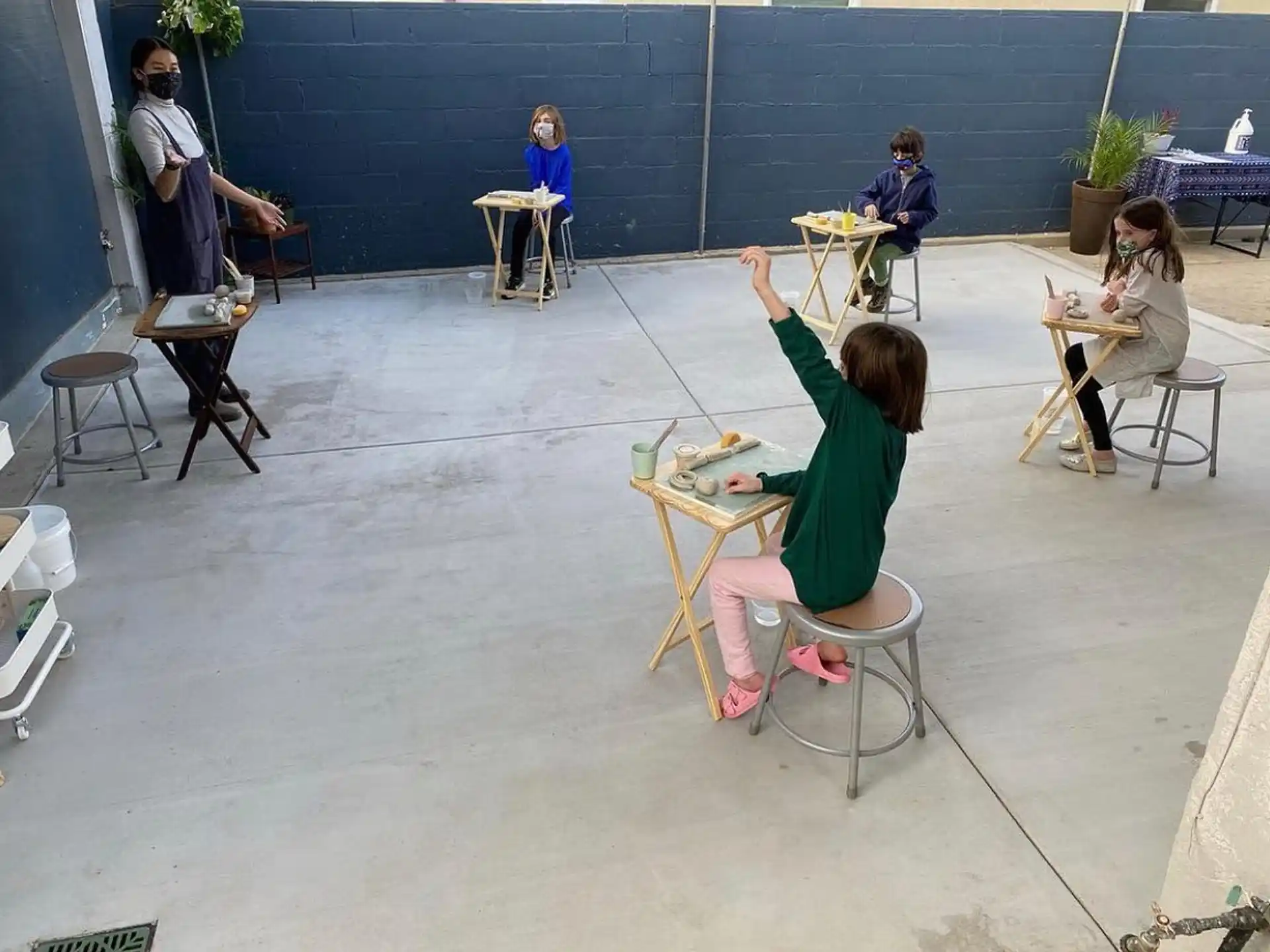 a group of people sitting at tables