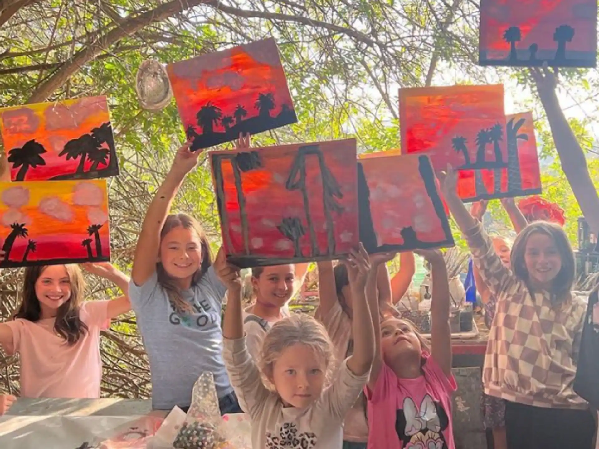 a group of children holding up signs