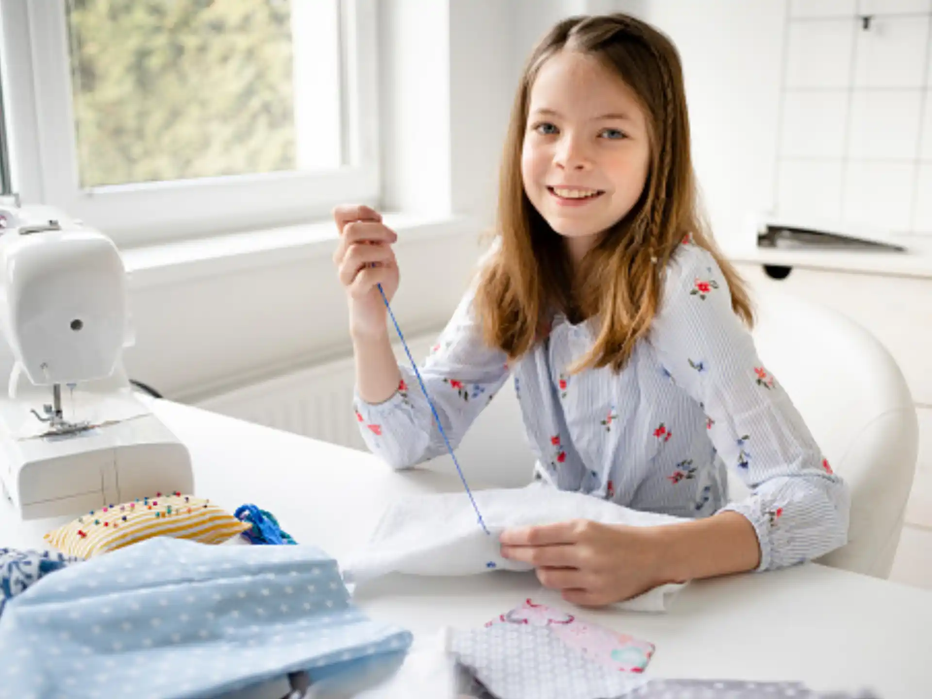 a girl painting a picture