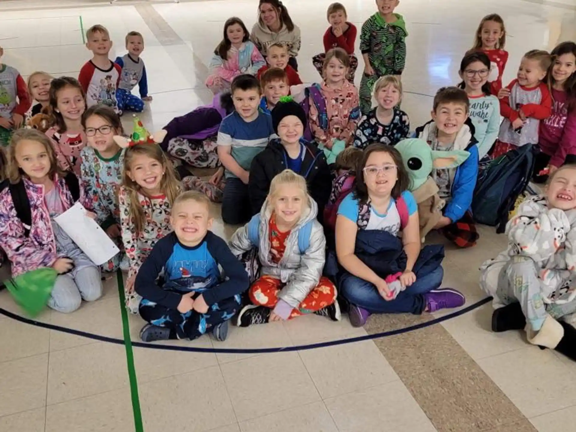 a group of children posing for a photo