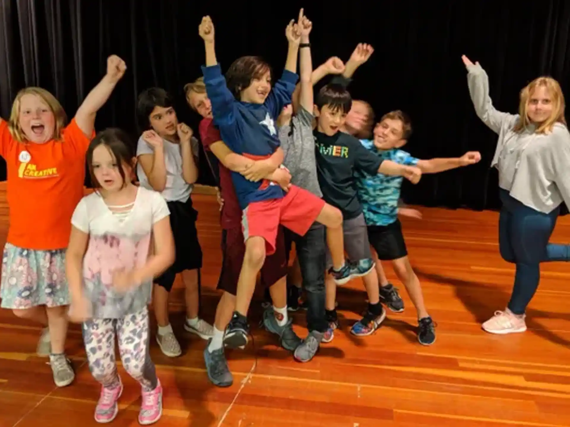 a group of children dancing