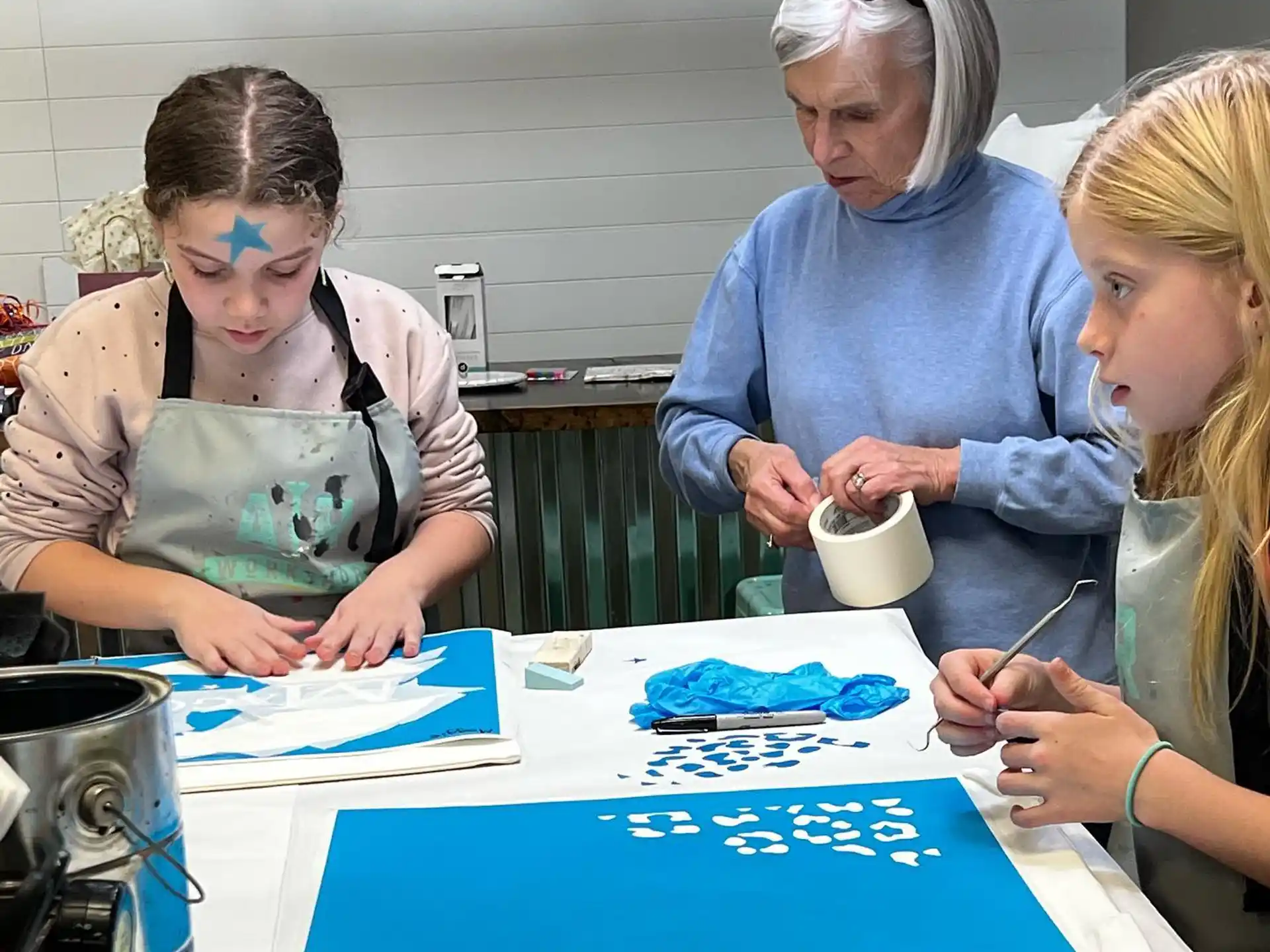 a group of women painting