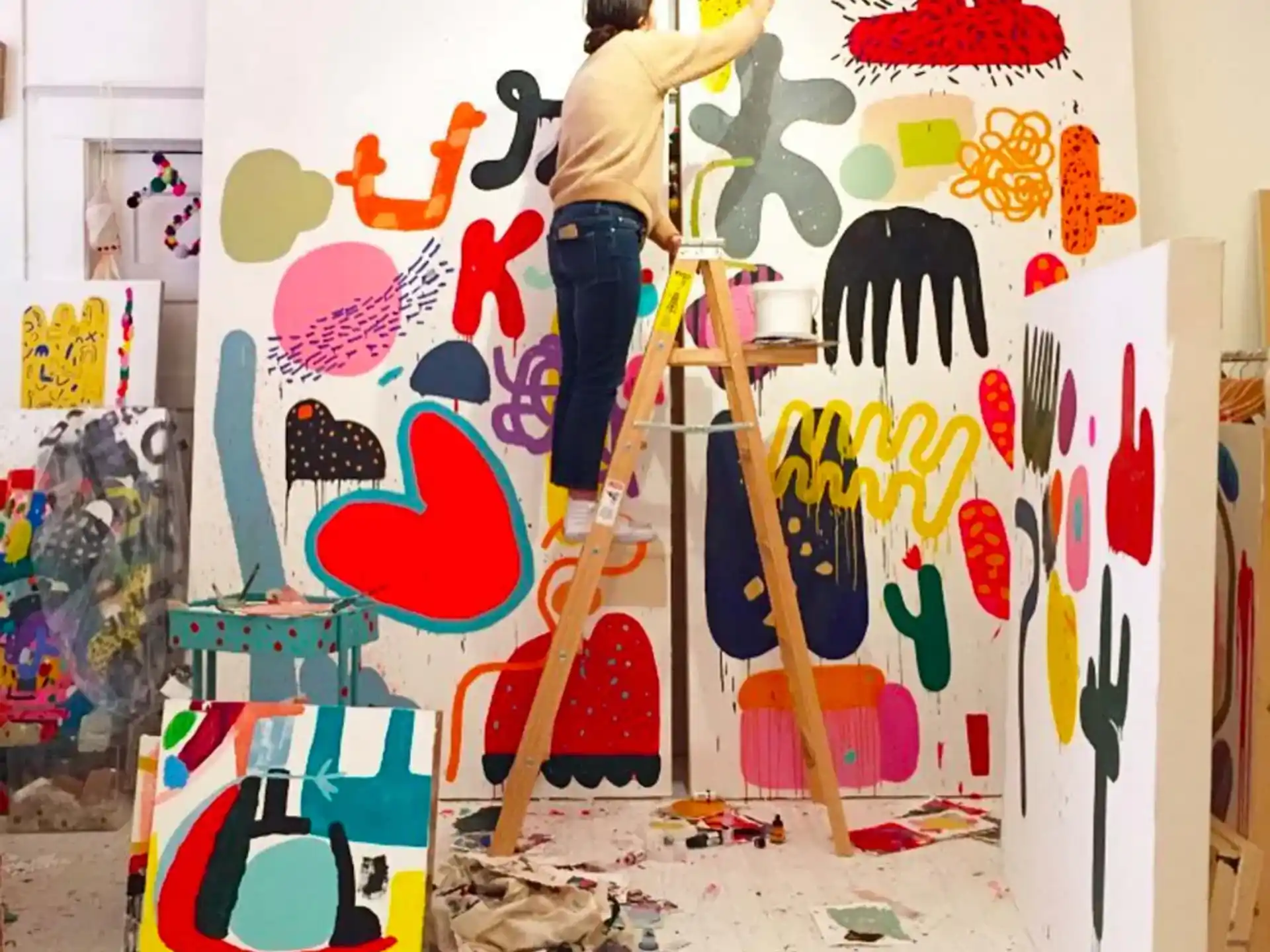 a person painting a wall