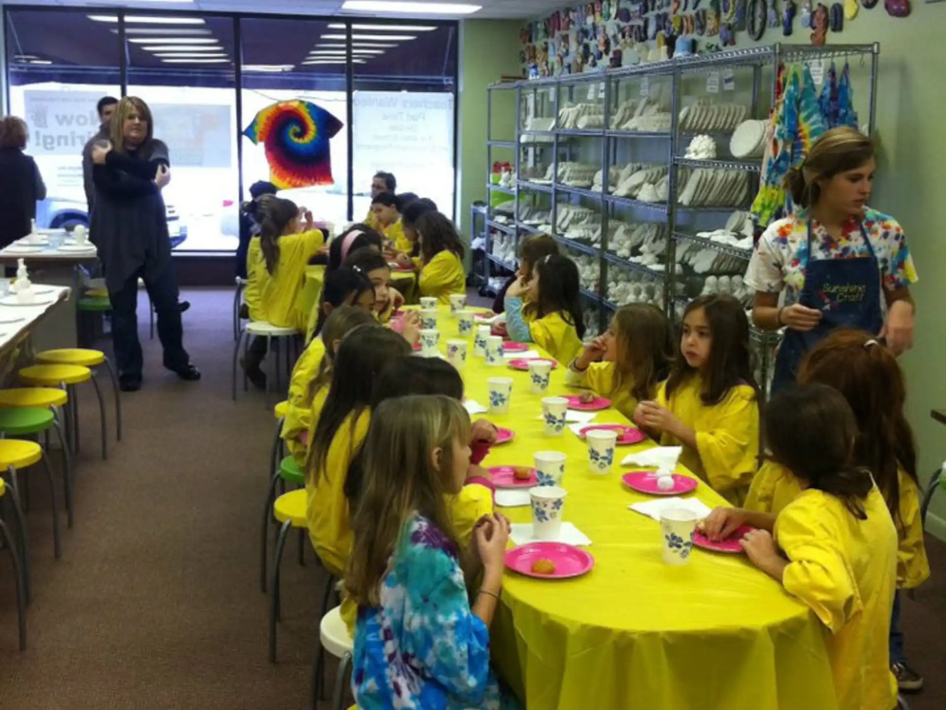 a group of children sitting at tables