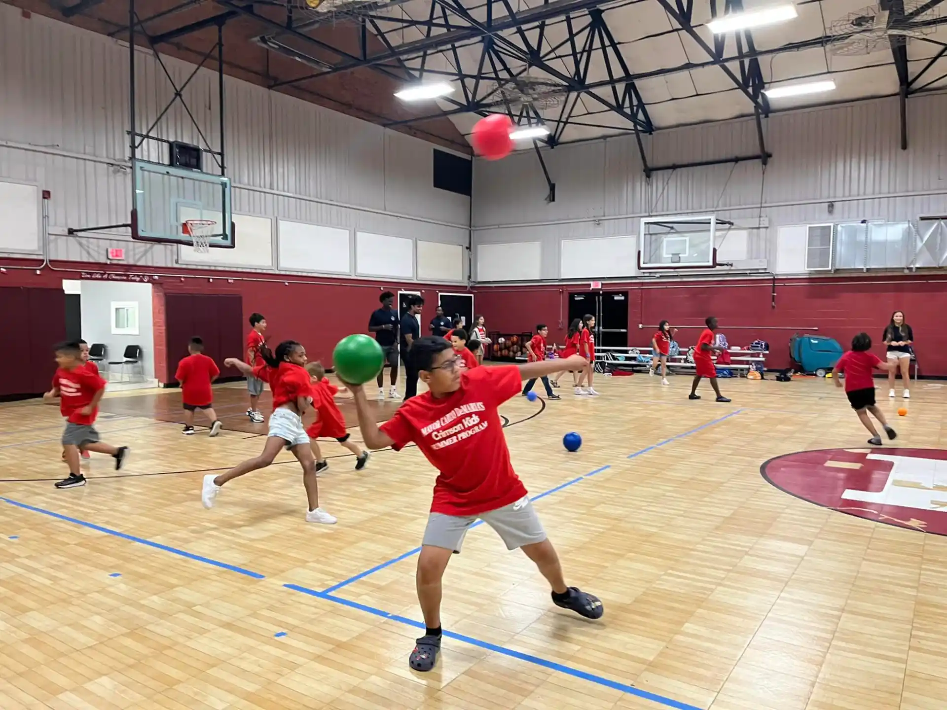 a group of people playing volleyball
