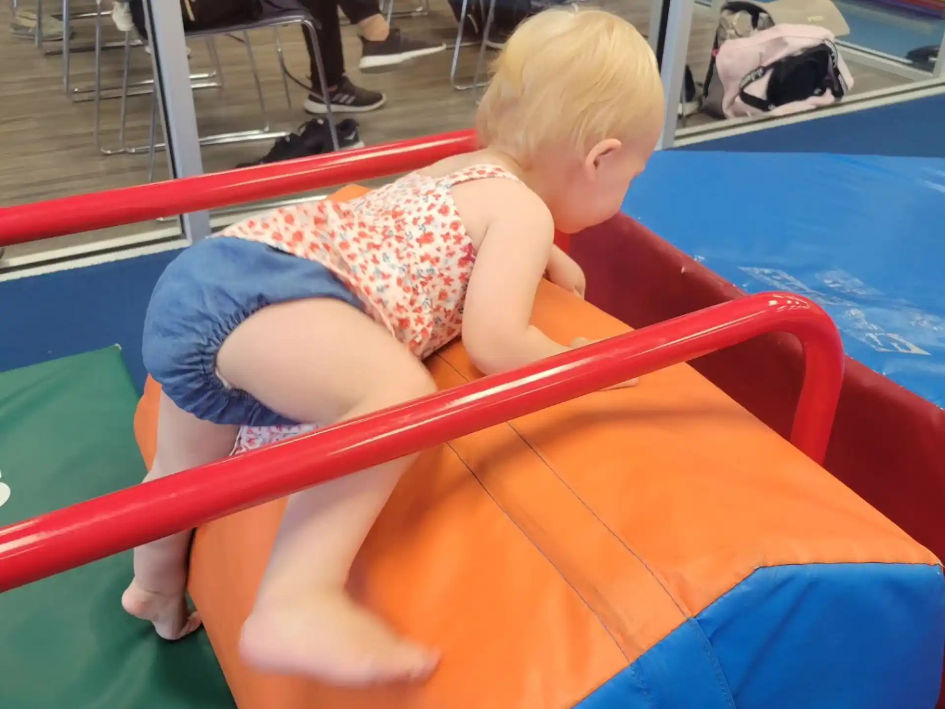 a child sitting in a pool