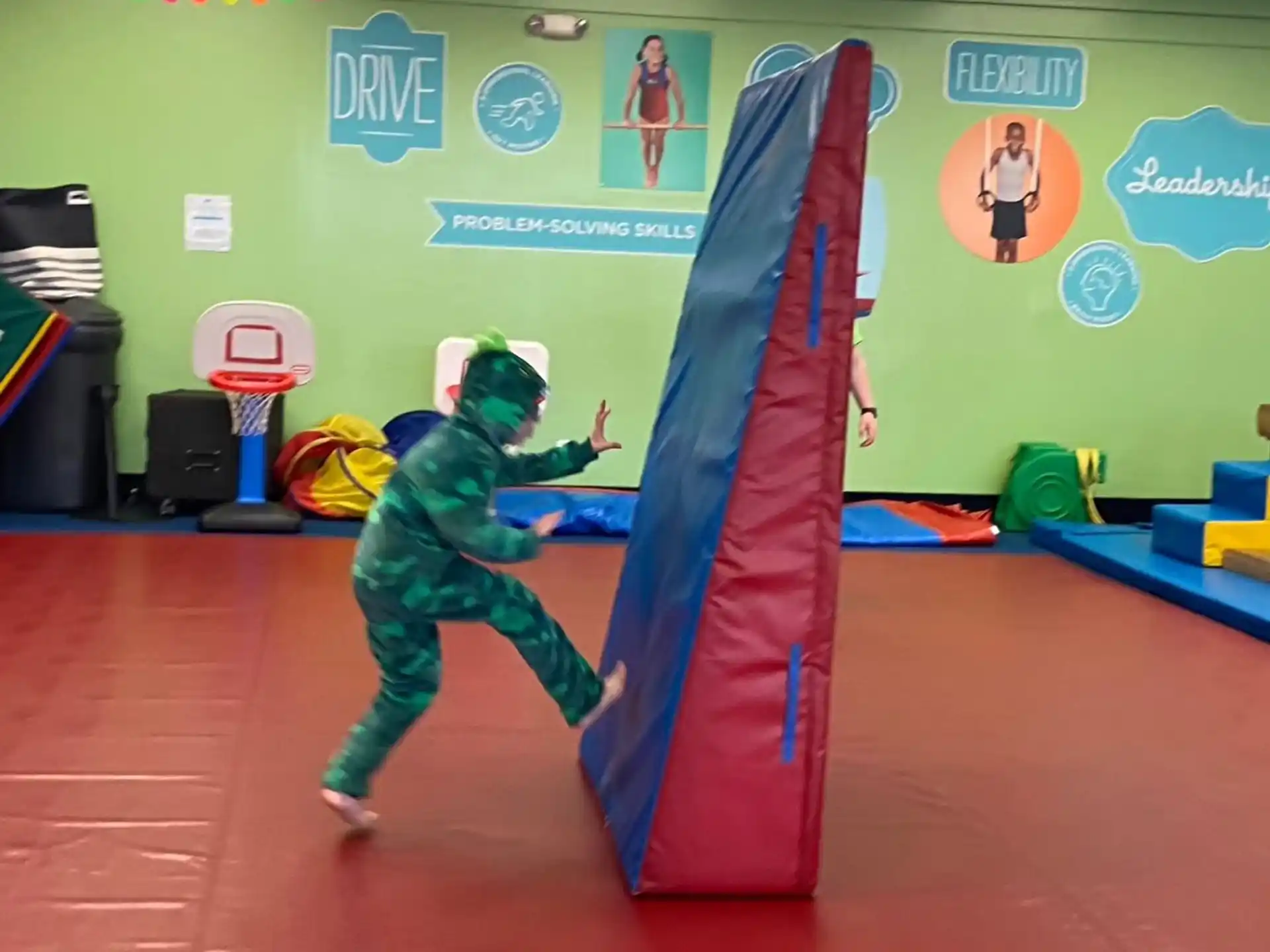 a kid playing with a surfboard