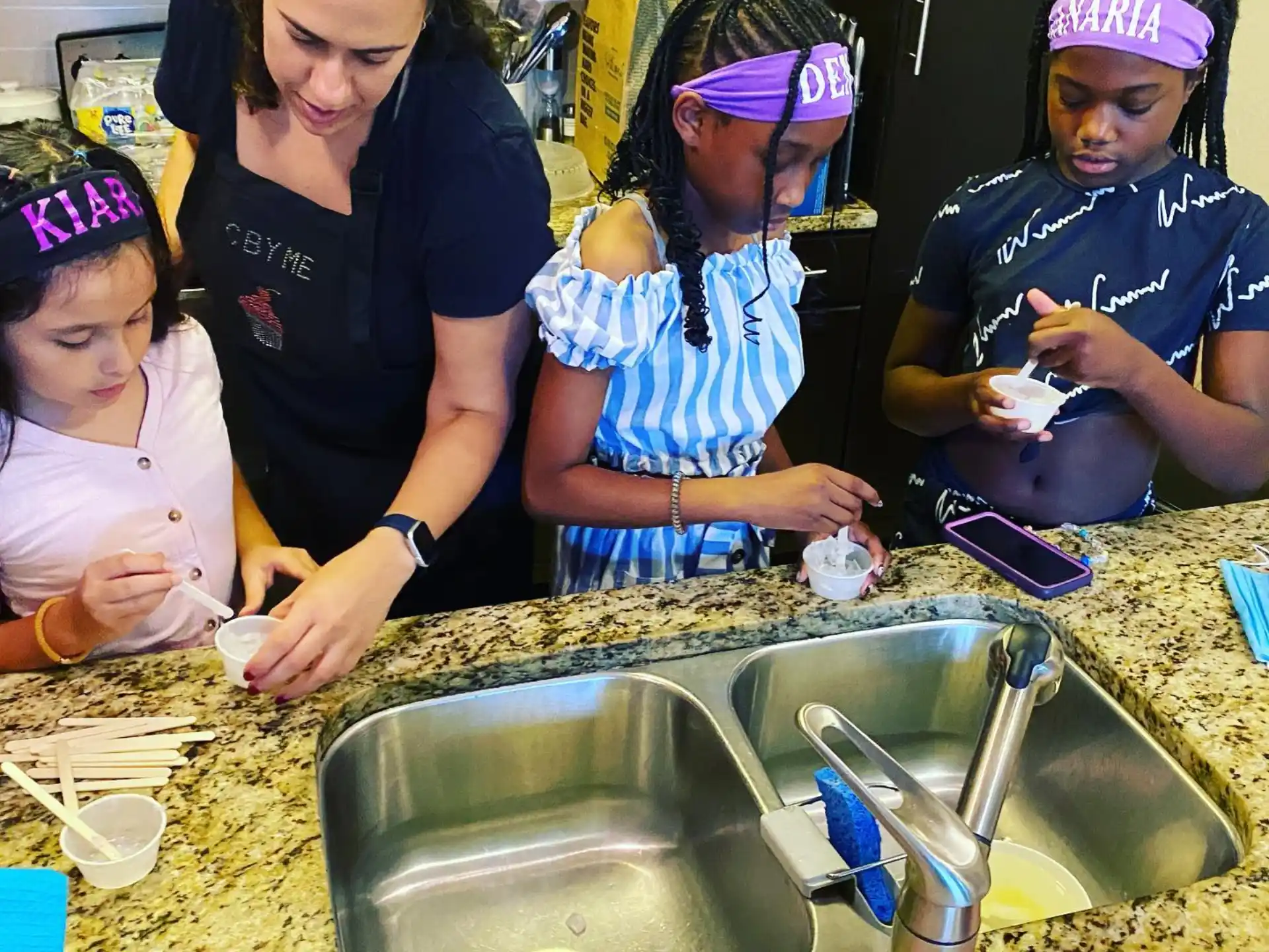 a group of people making food