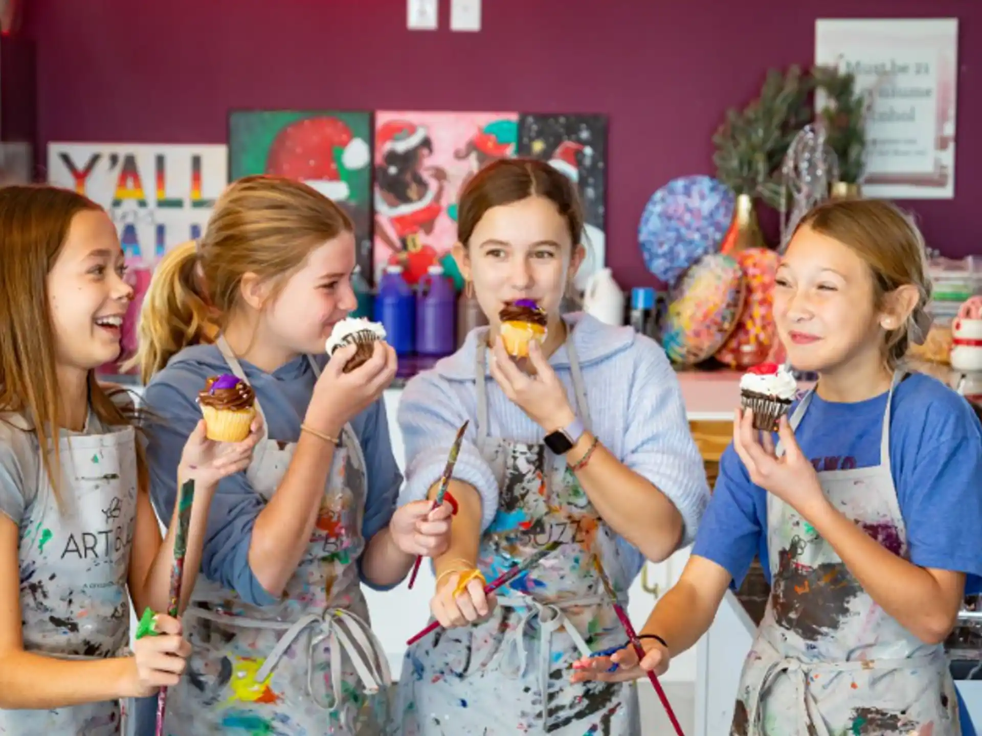 a group of girls holding ice cream cones