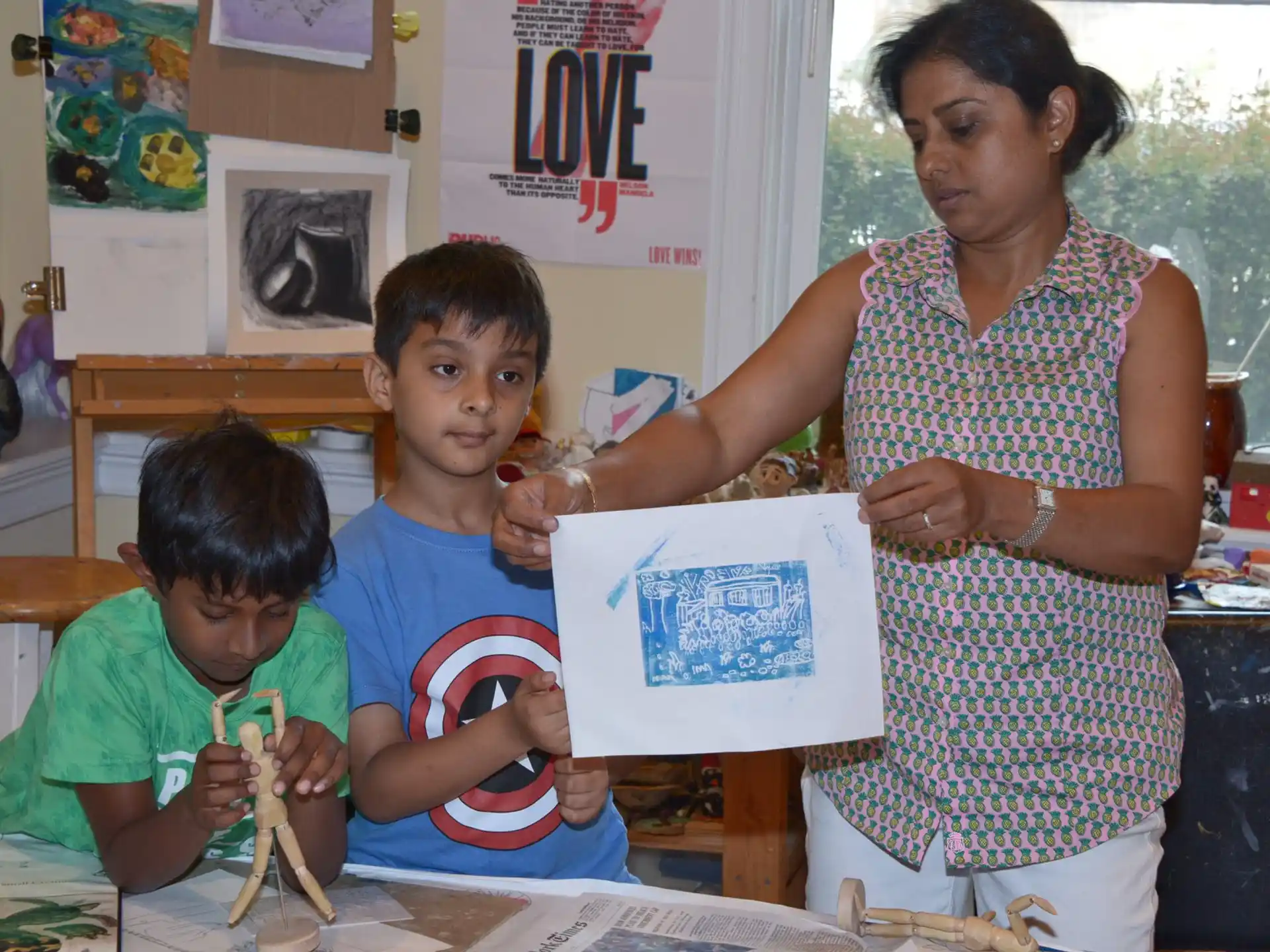 a person and two boys