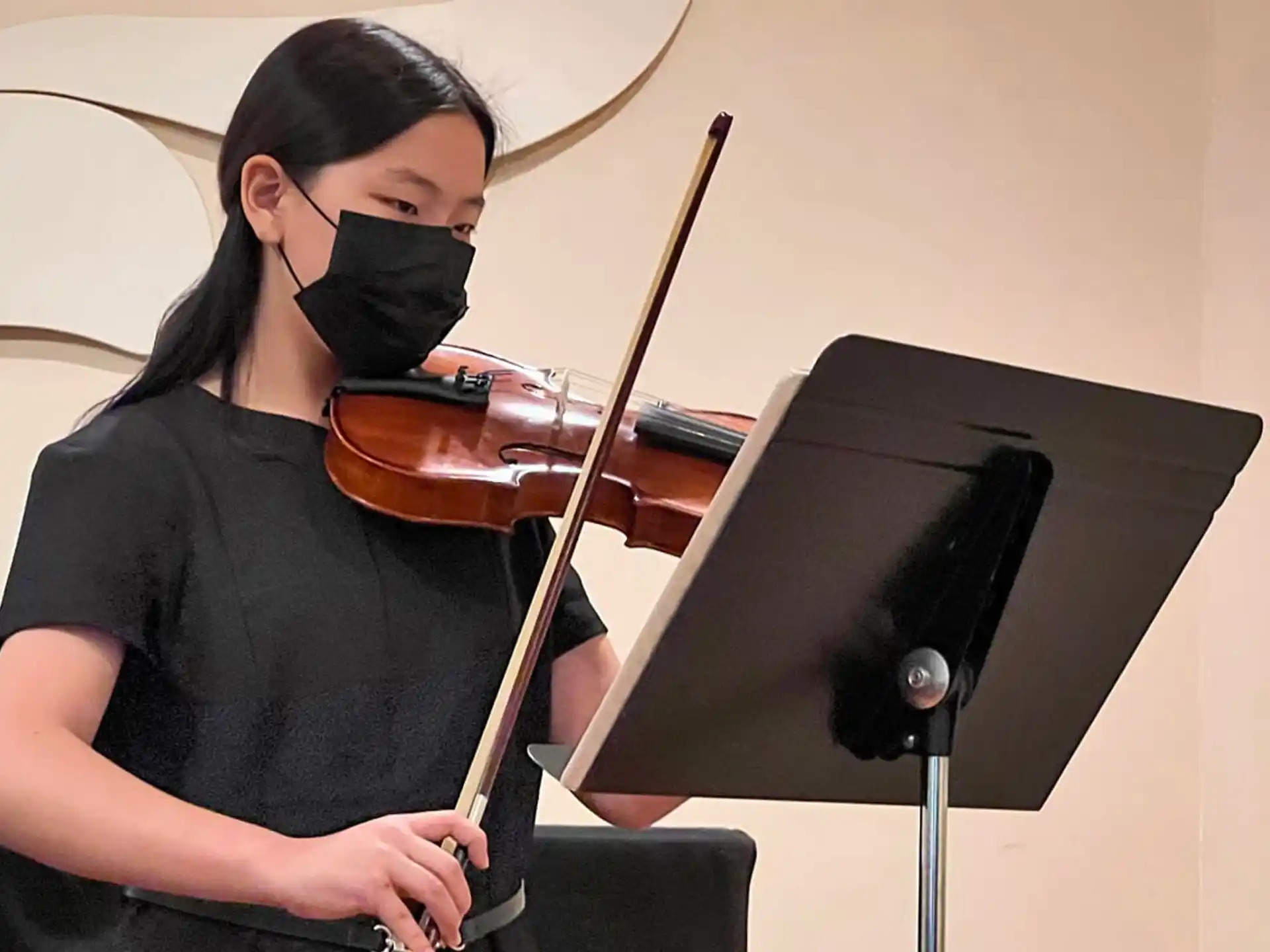 a person playing a violin