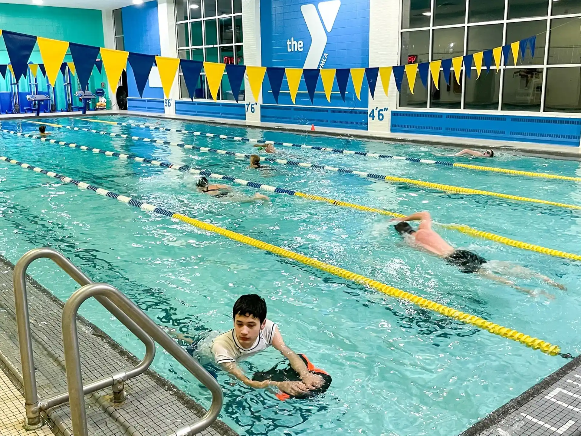 a boy in a pool